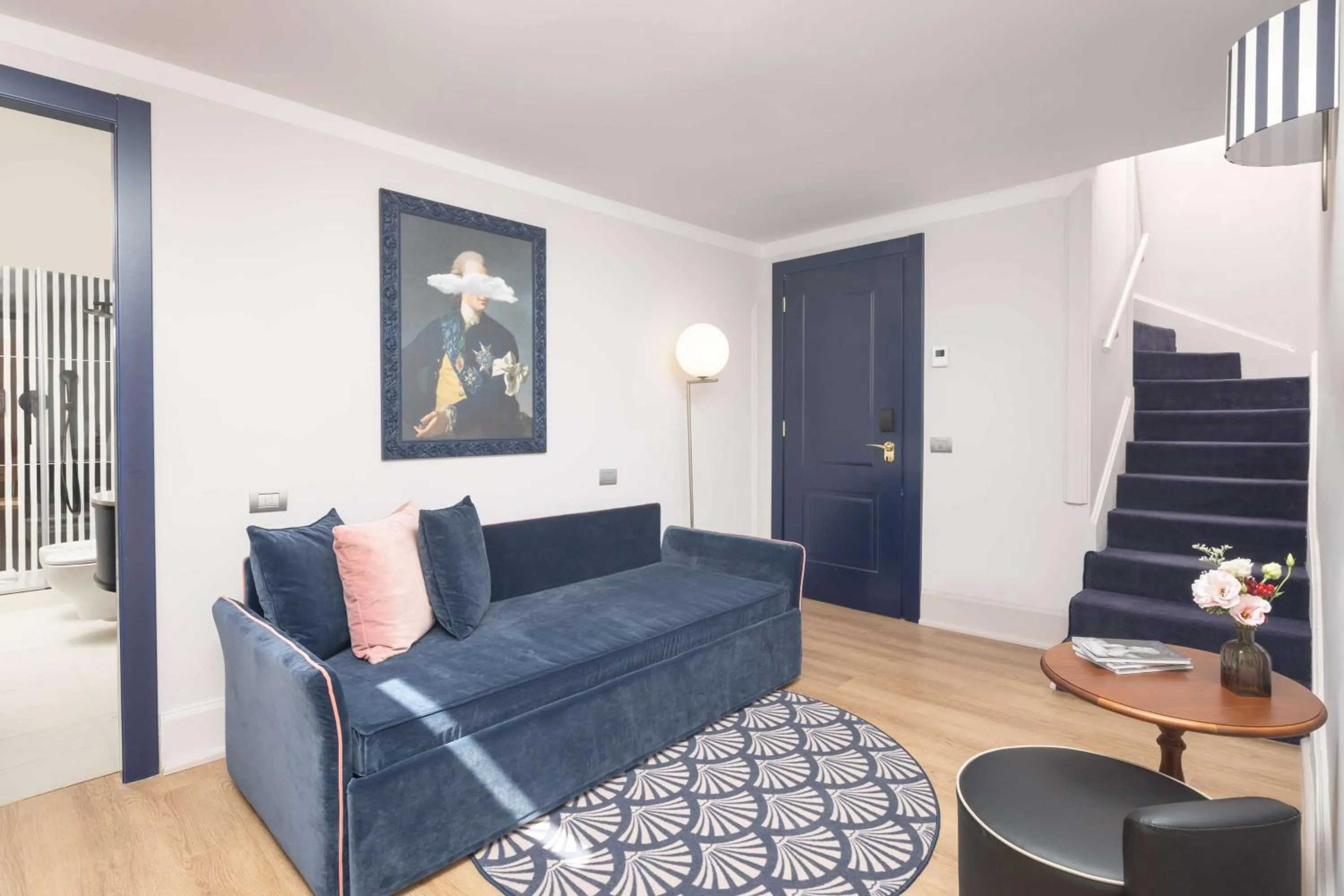 Living room in Anglo American Hotel Florence, Curio Collection By Hilton