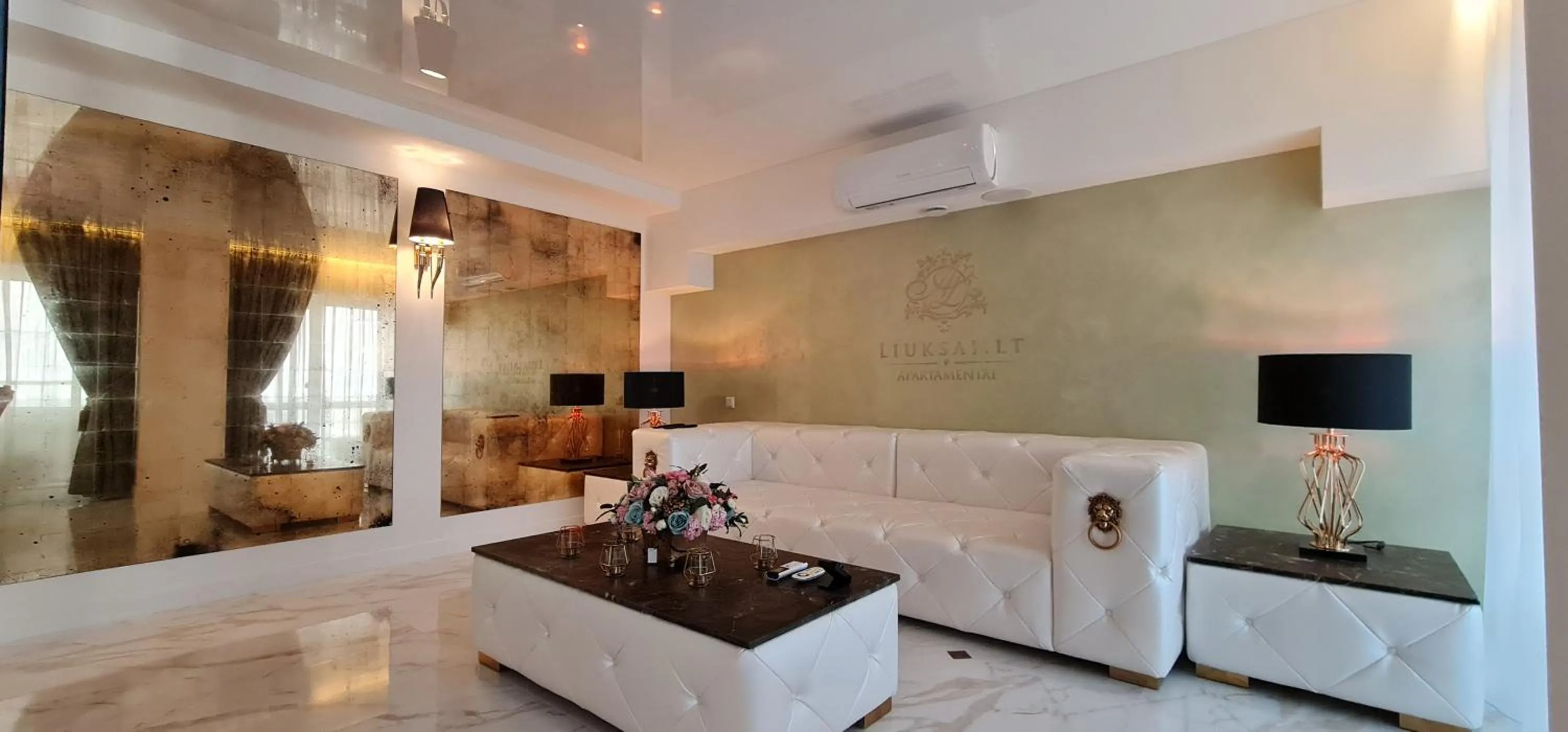 Living room in Prestige Jacuzzi Apartment by LIUKSAI
