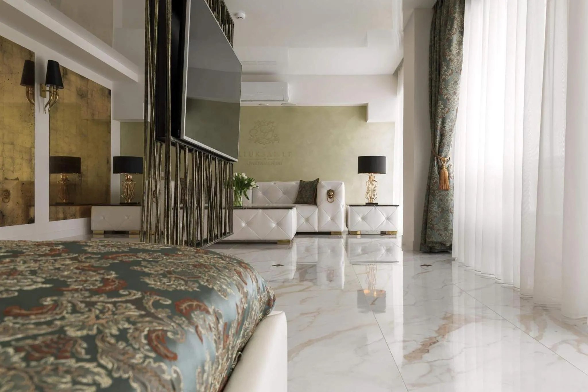 Bed in Prestige Jacuzzi Apartment by LIUKSAI