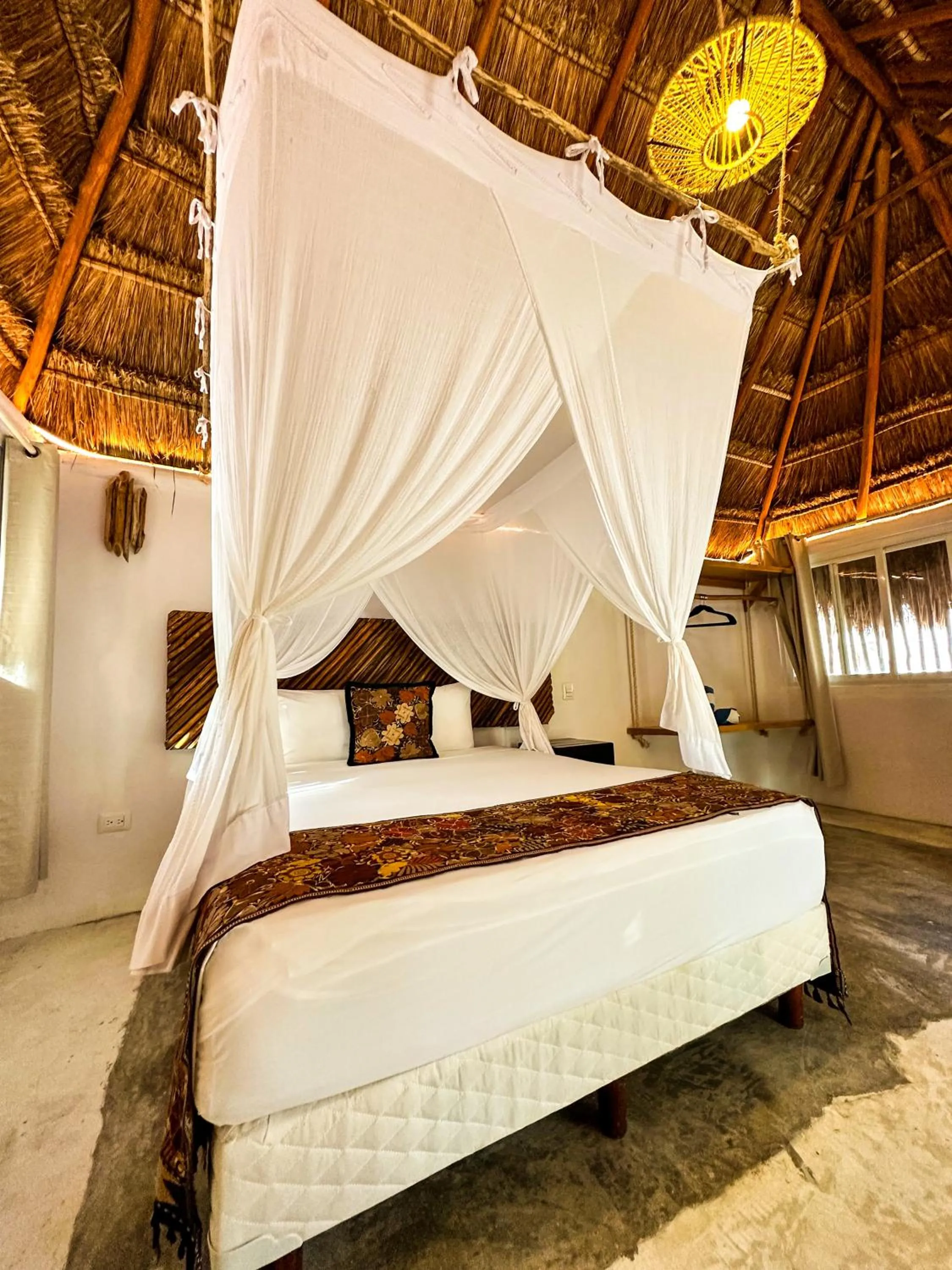 Bed in Alito Tulum Hotel