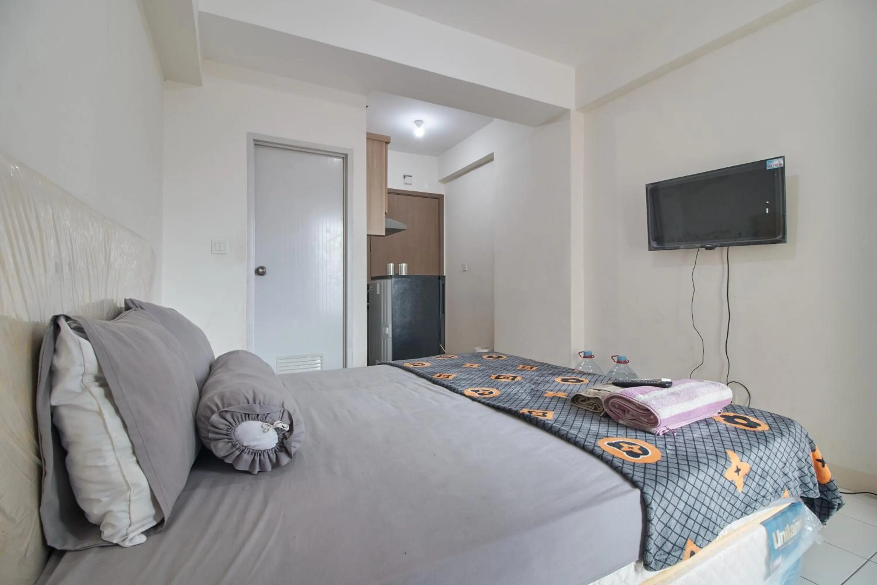 Bed in Room Rendi Podomoro Golf View