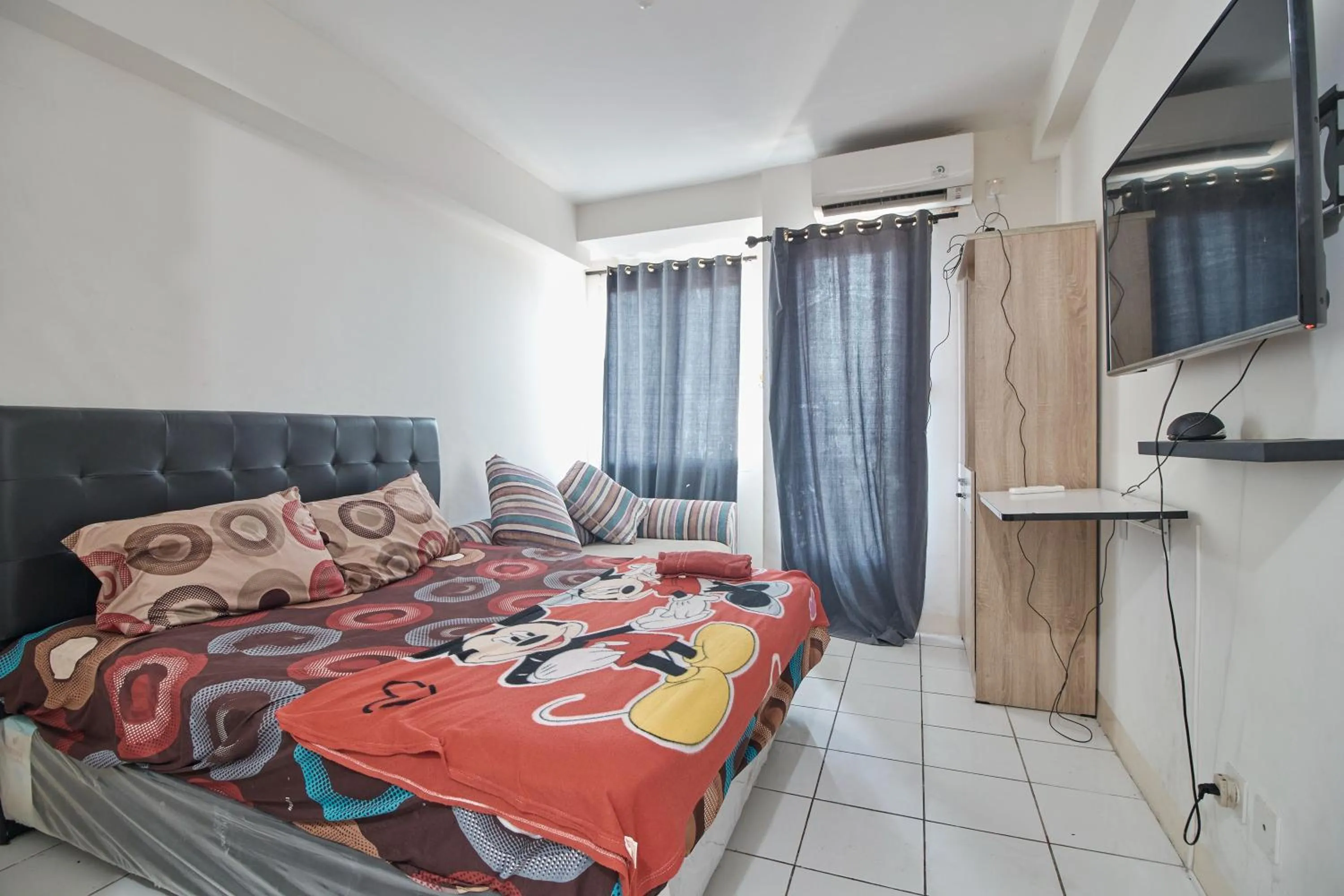 Bed in Room Rendi Podomoro Golf View