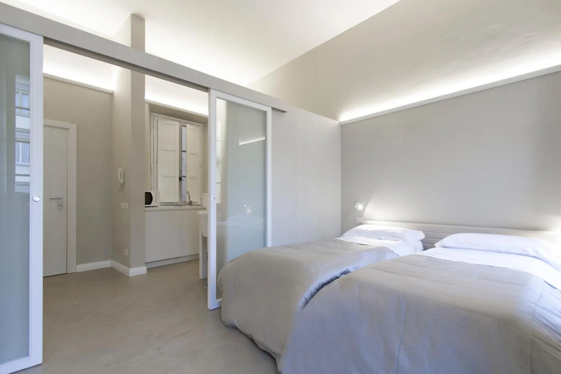 Bed in Palazzo dei Ciompi Suites