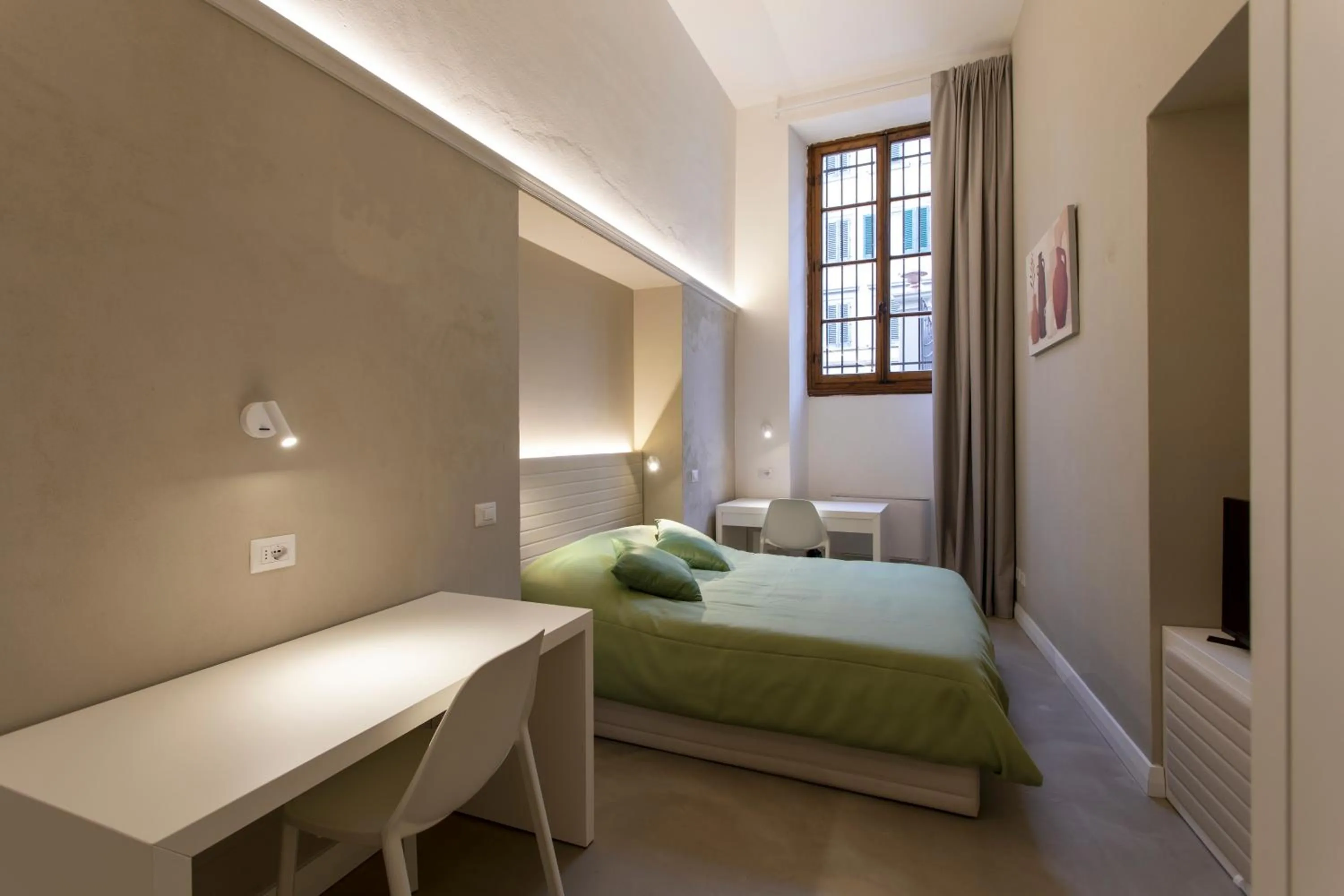 Bed in Palazzo dei Ciompi Suites