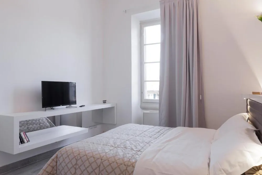 Bed in Palazzo dei Ciompi Suites