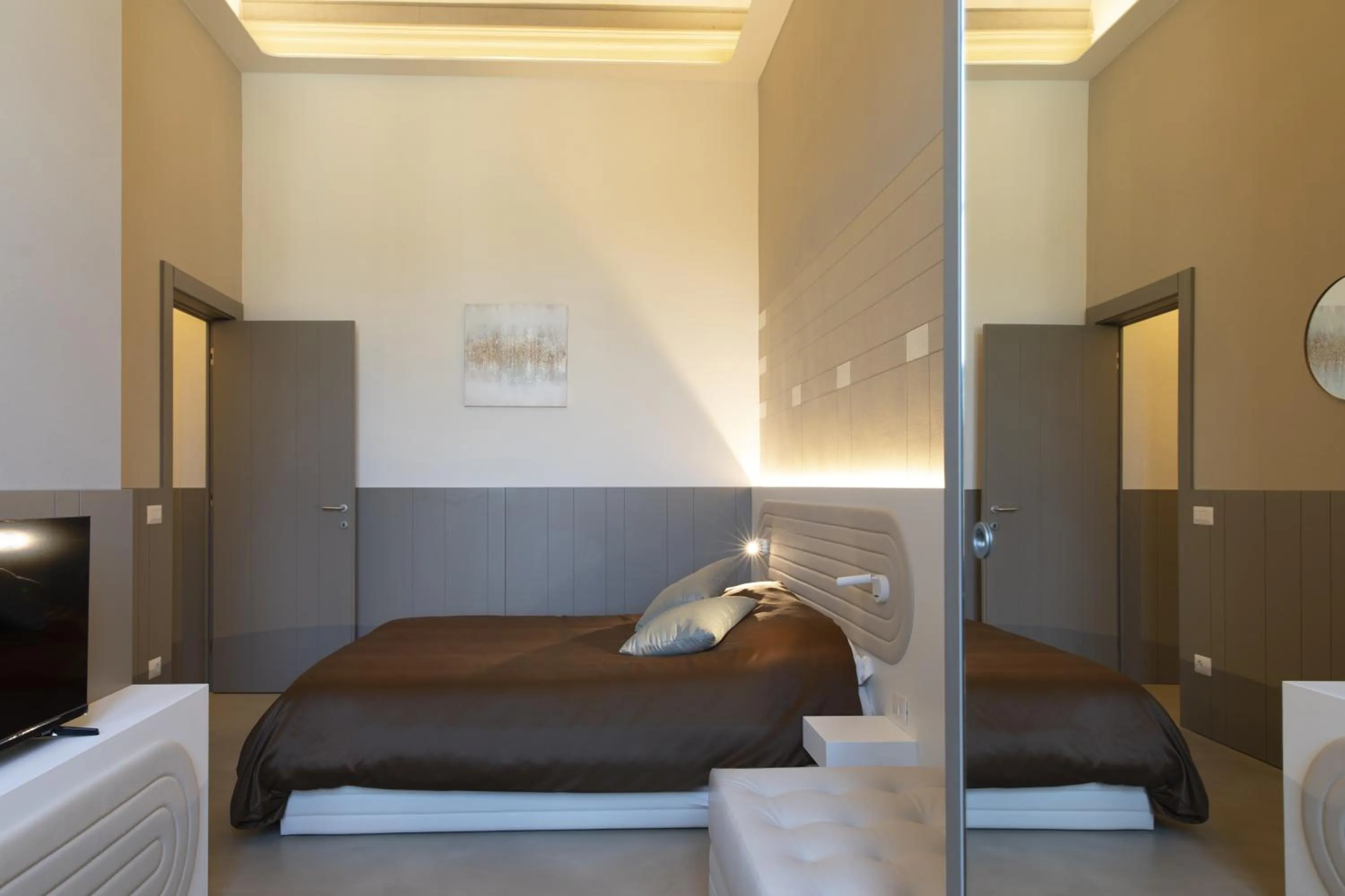 Bed in Palazzo dei Ciompi Suites