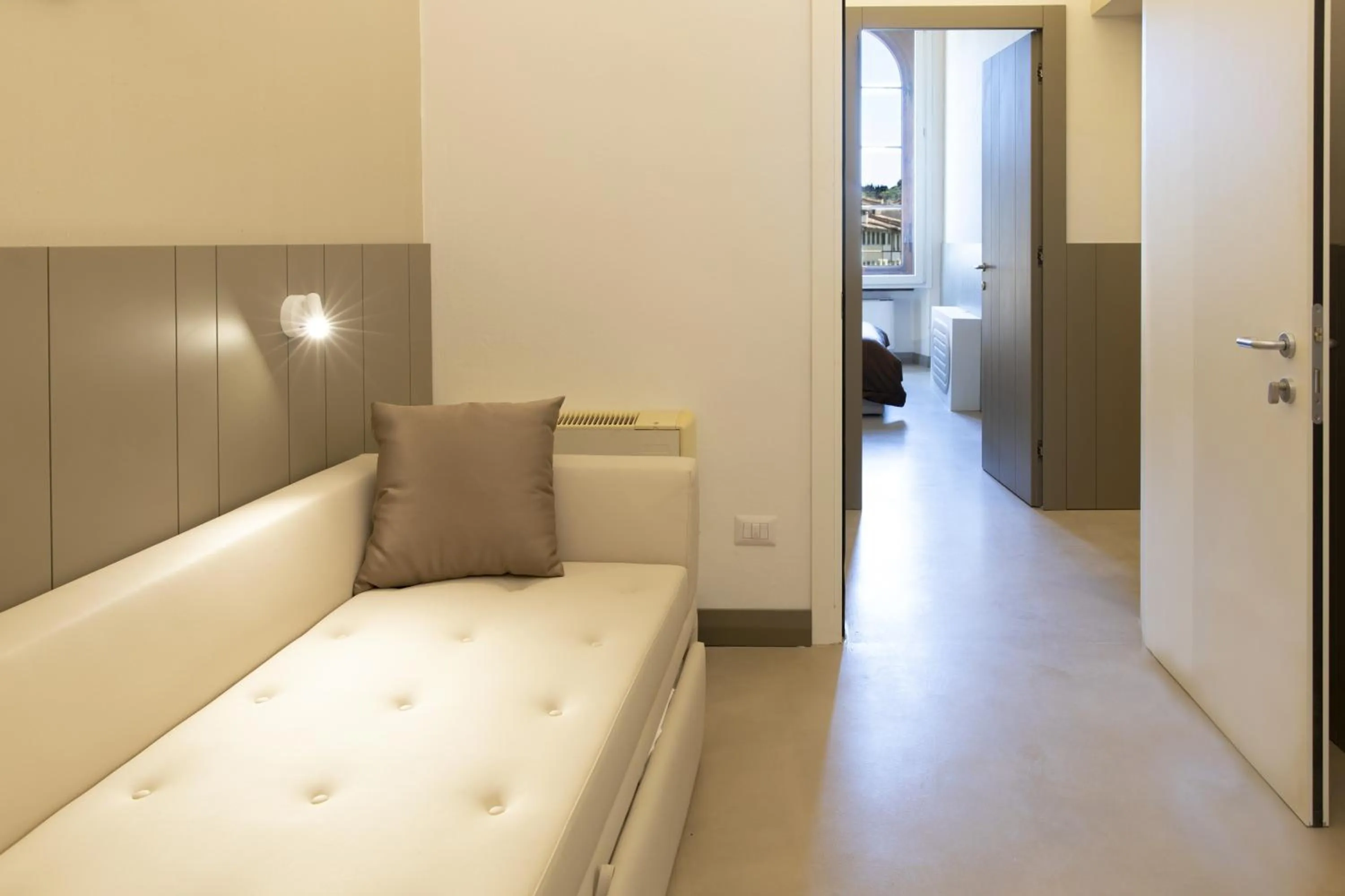 Living room, Bed in Palazzo dei Ciompi Suites