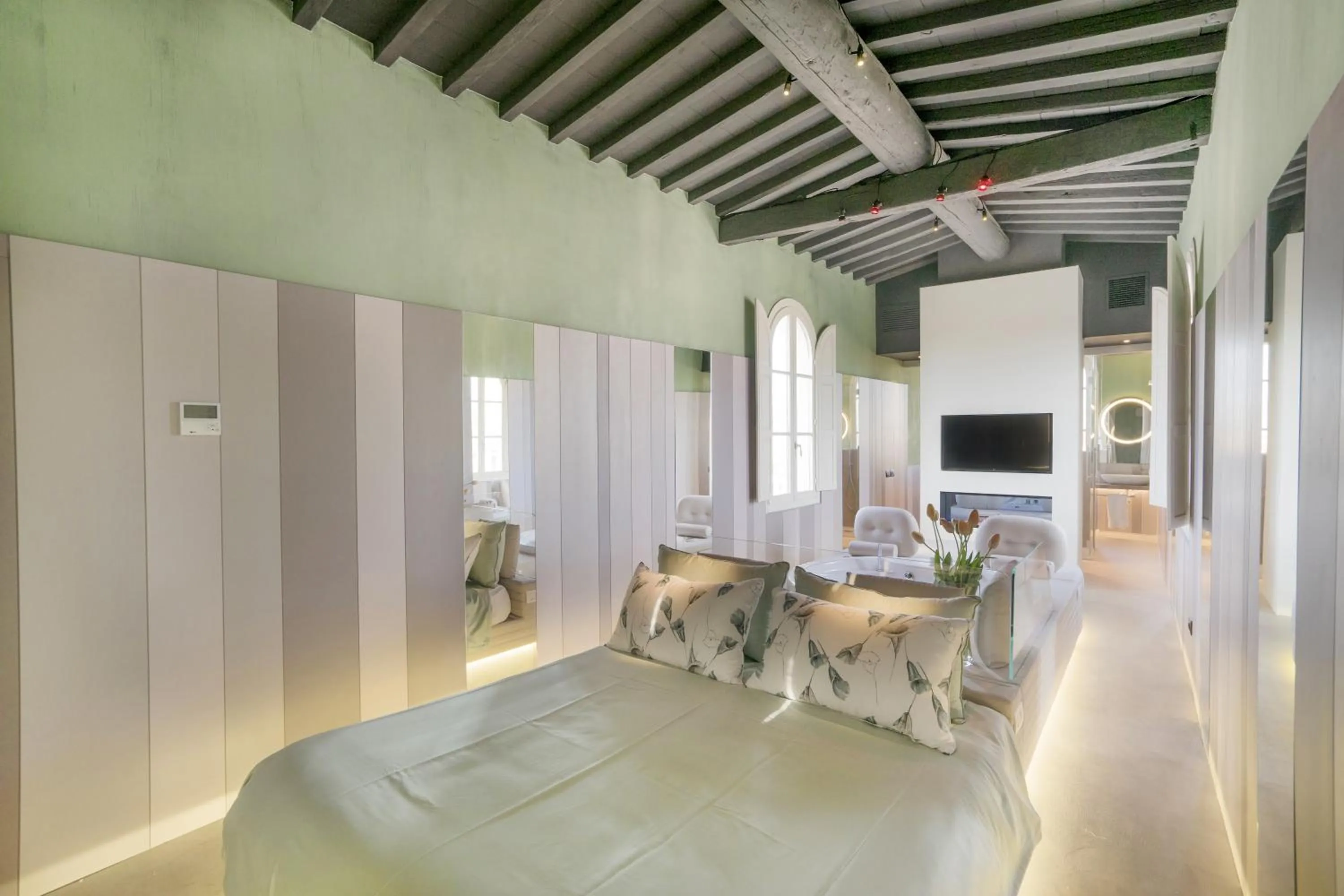 Bed in Palazzo dei Ciompi Suites