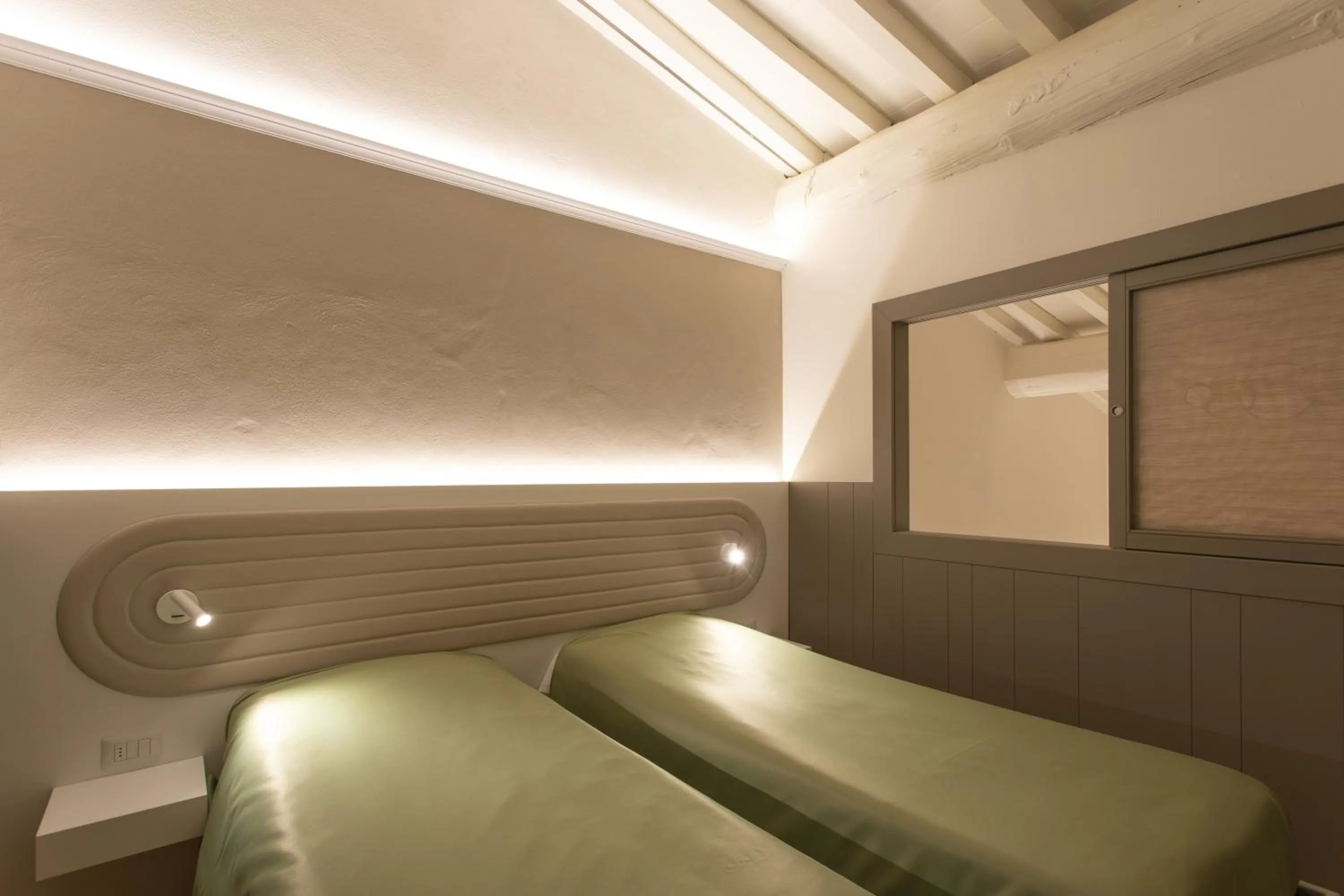 Bed in Palazzo dei Ciompi Suites