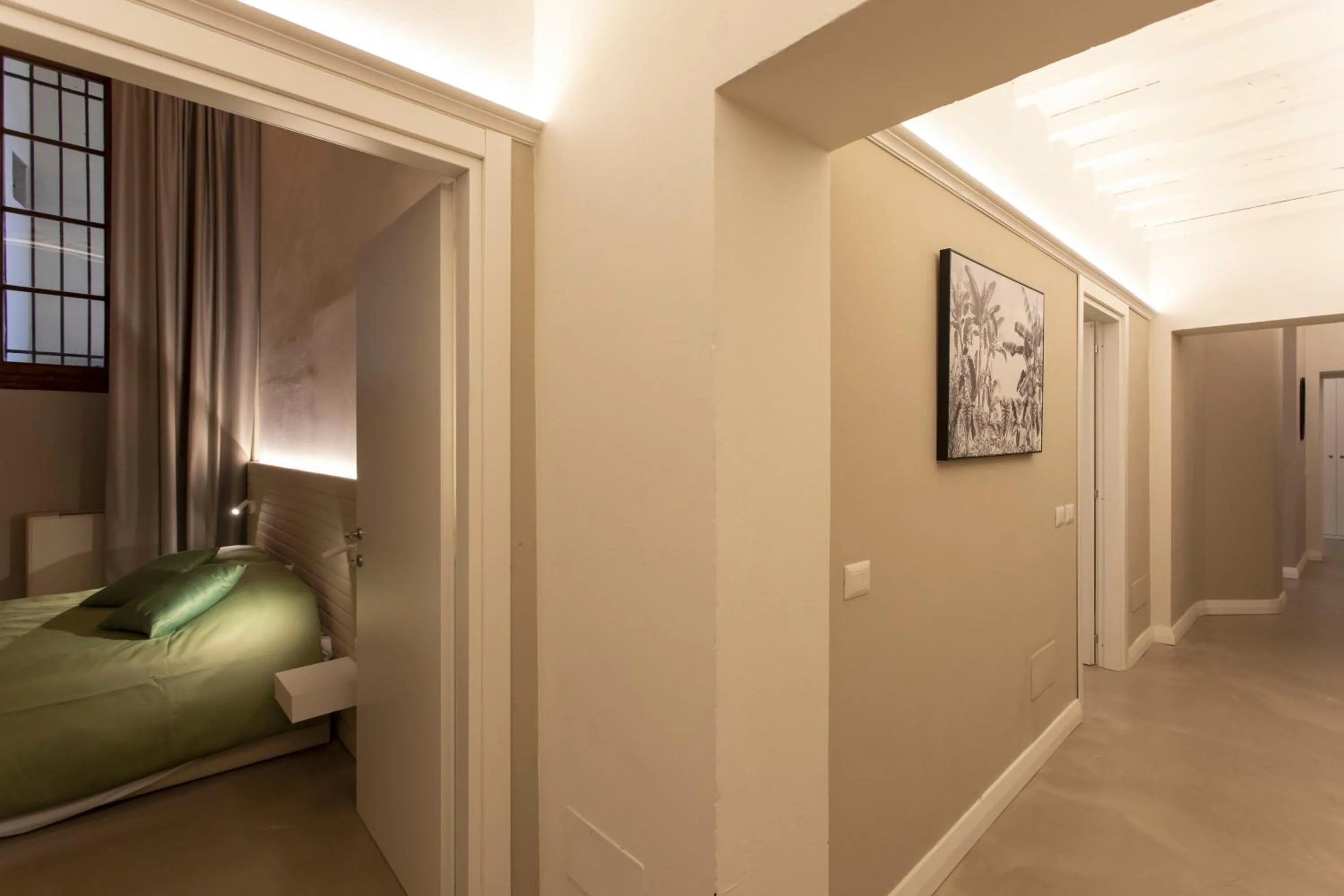 Bed in Palazzo dei Ciompi Suites