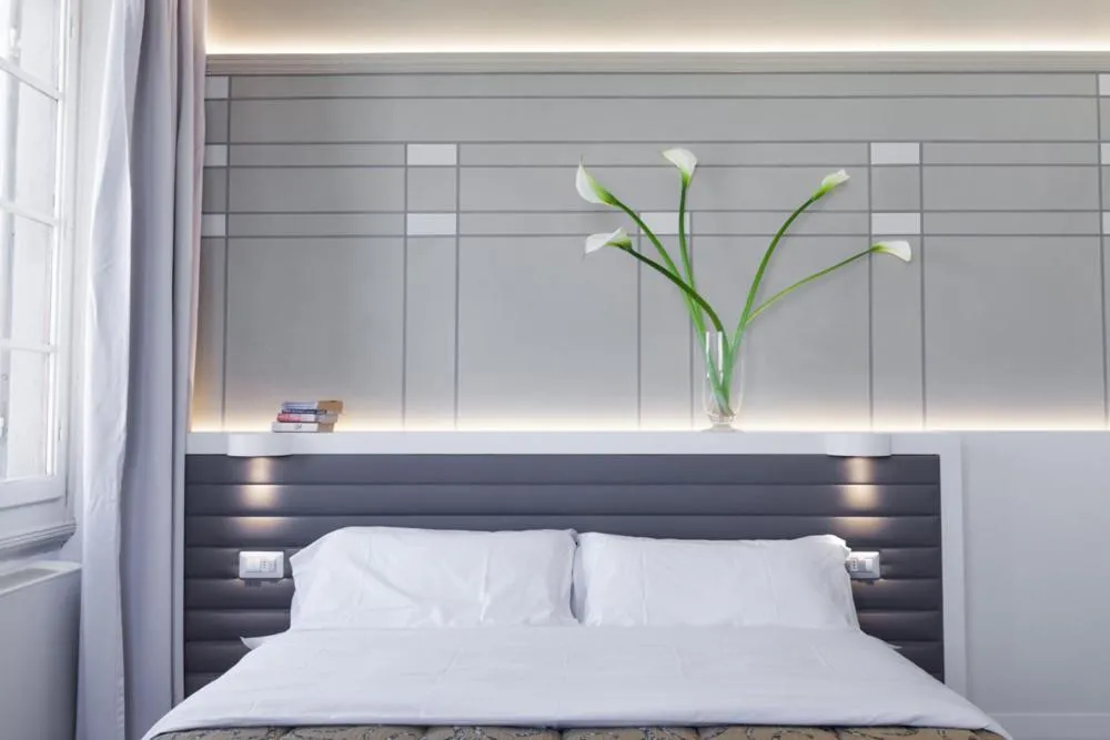 Bed in Palazzo dei Ciompi Suites