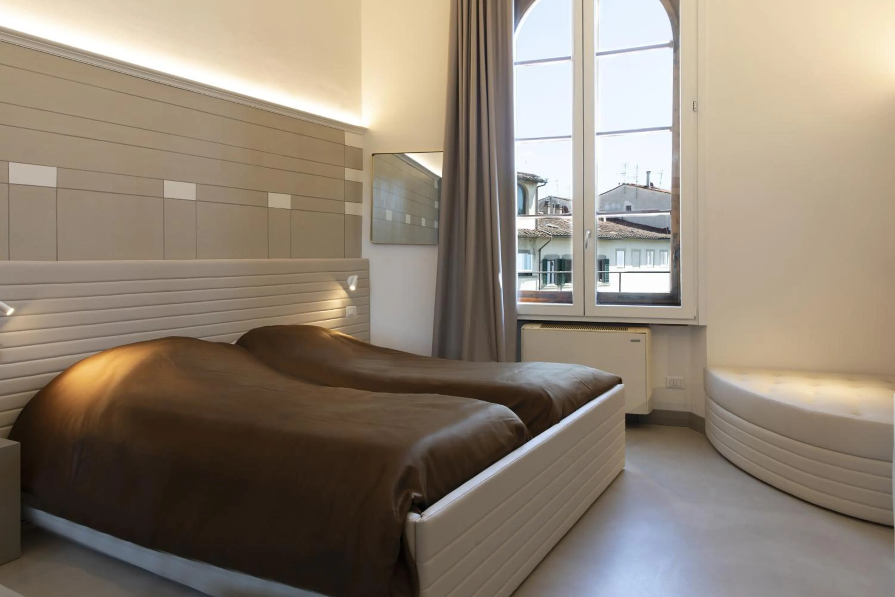 Bed in Palazzo dei Ciompi Suites