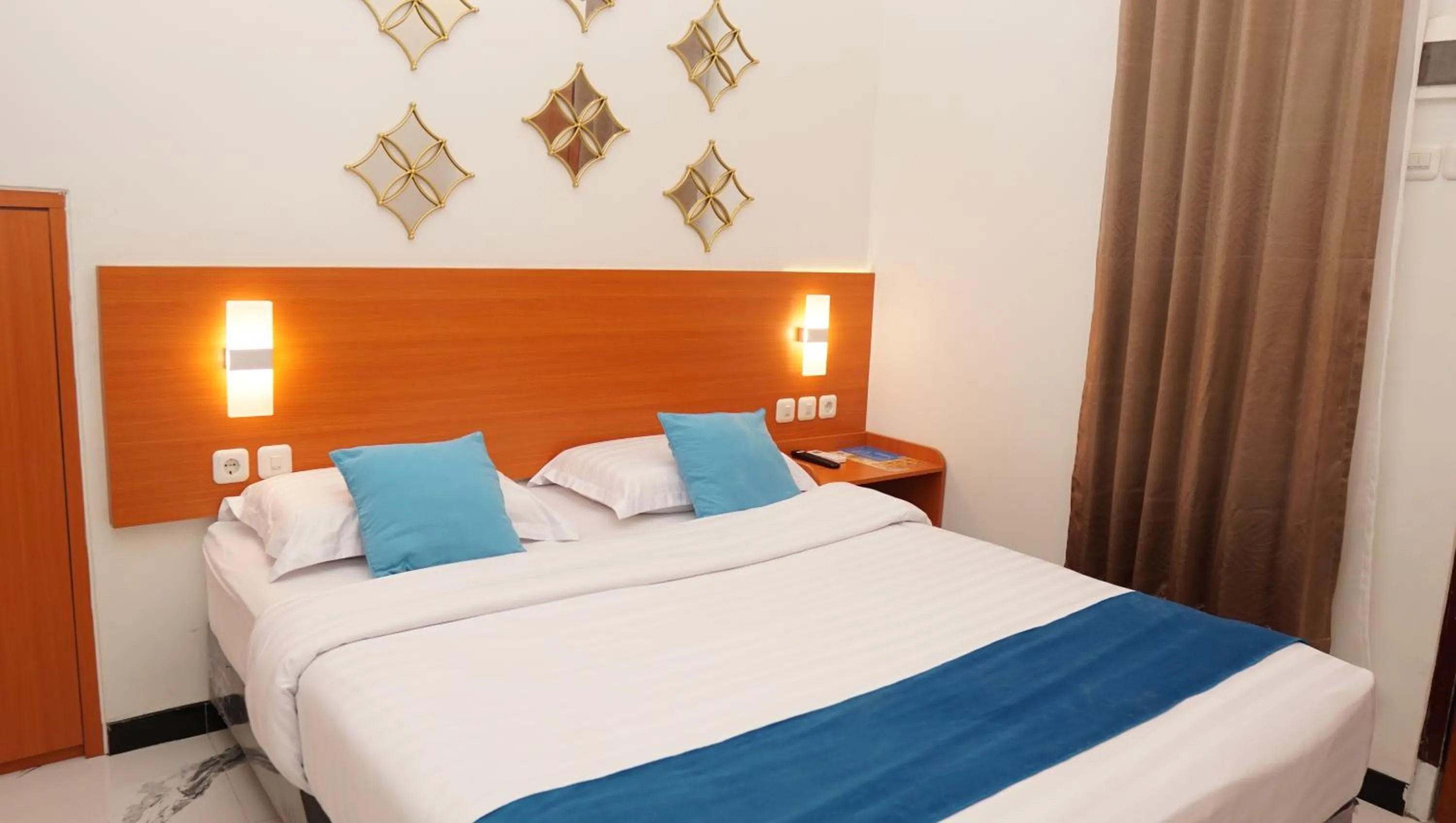 Bed in Jazz Room Kampung Inggris Syariah