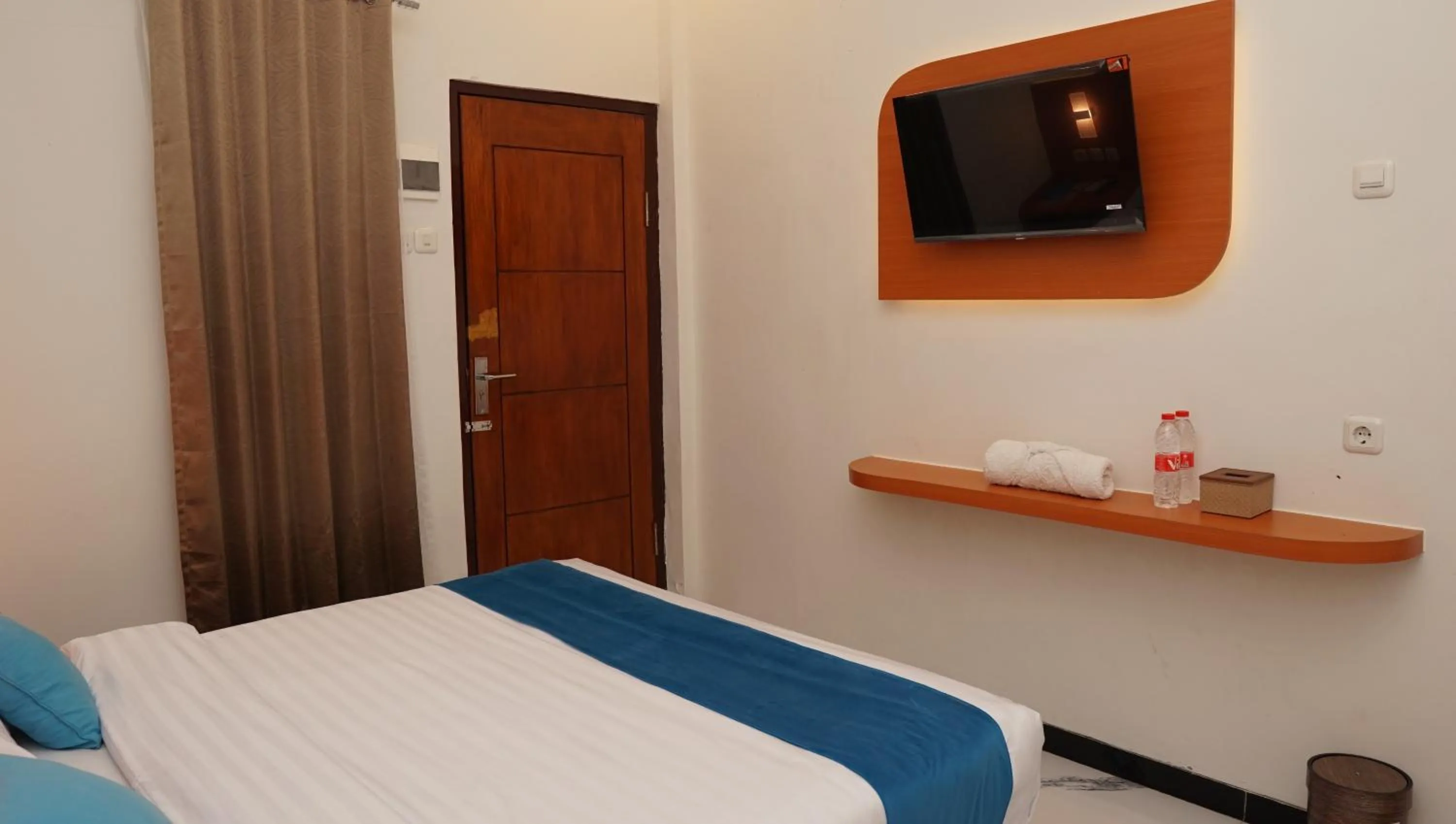 Bed in Jazz Room Kampung Inggris Syariah