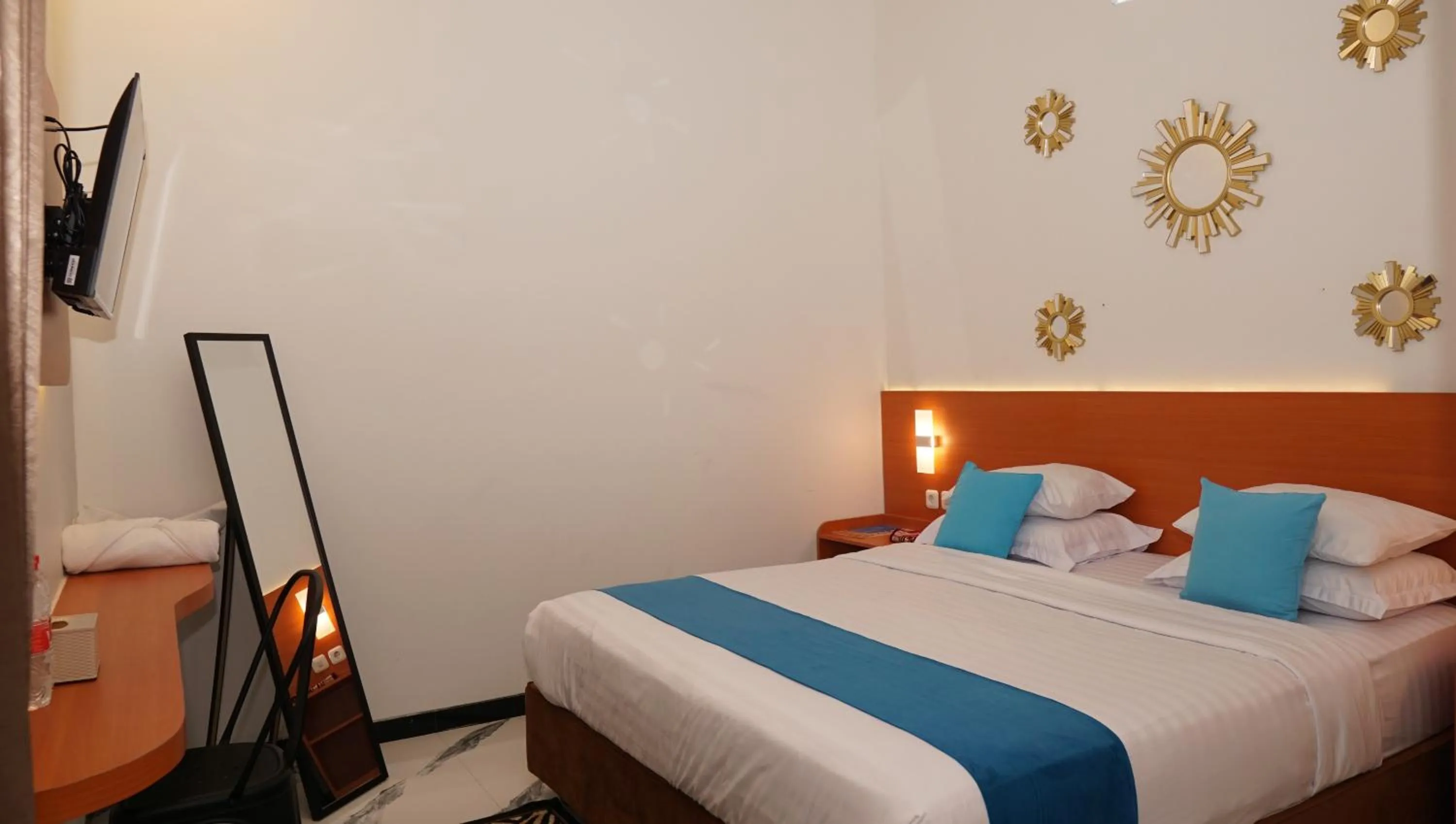 Bed in Jazz Room Kampung Inggris Syariah