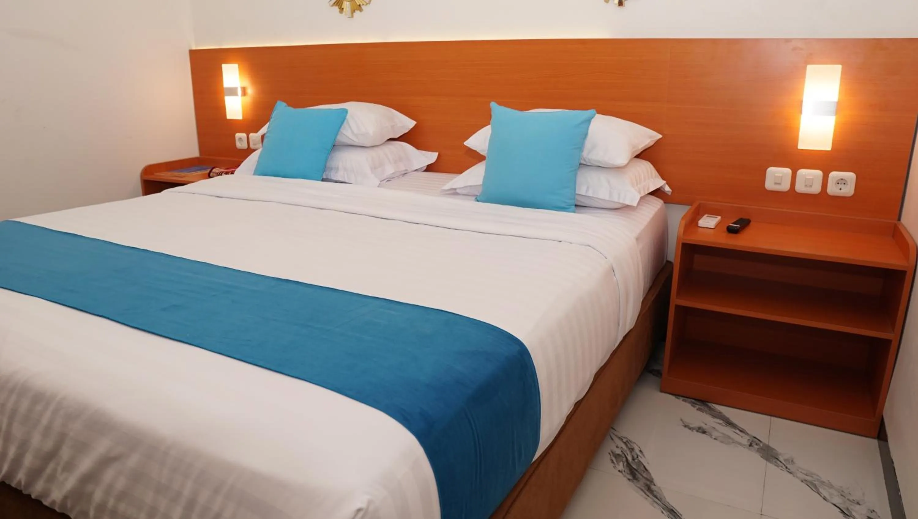 Bed in Jazz Room Kampung Inggris Syariah