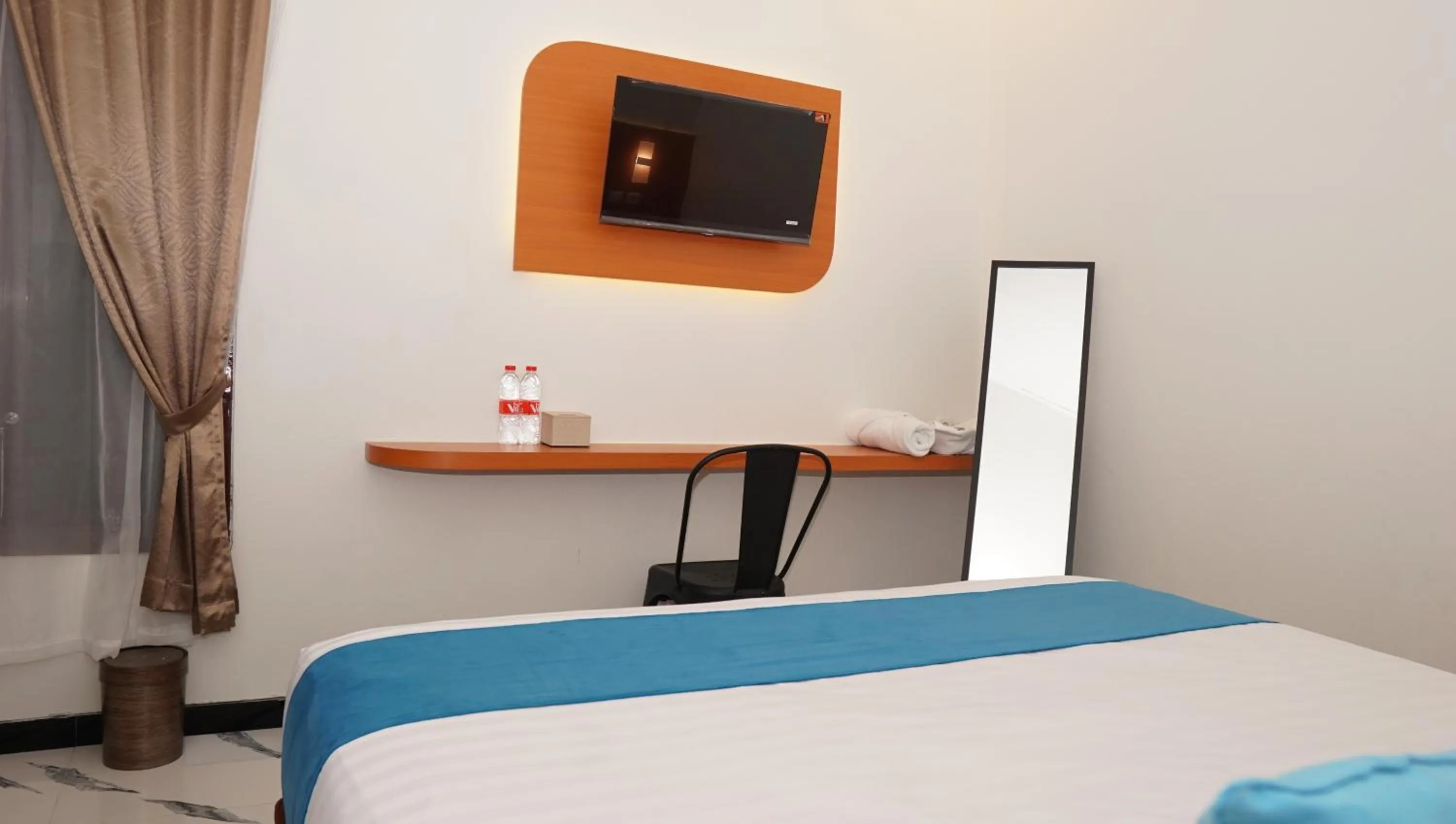 Bed in Jazz Room Kampung Inggris Syariah