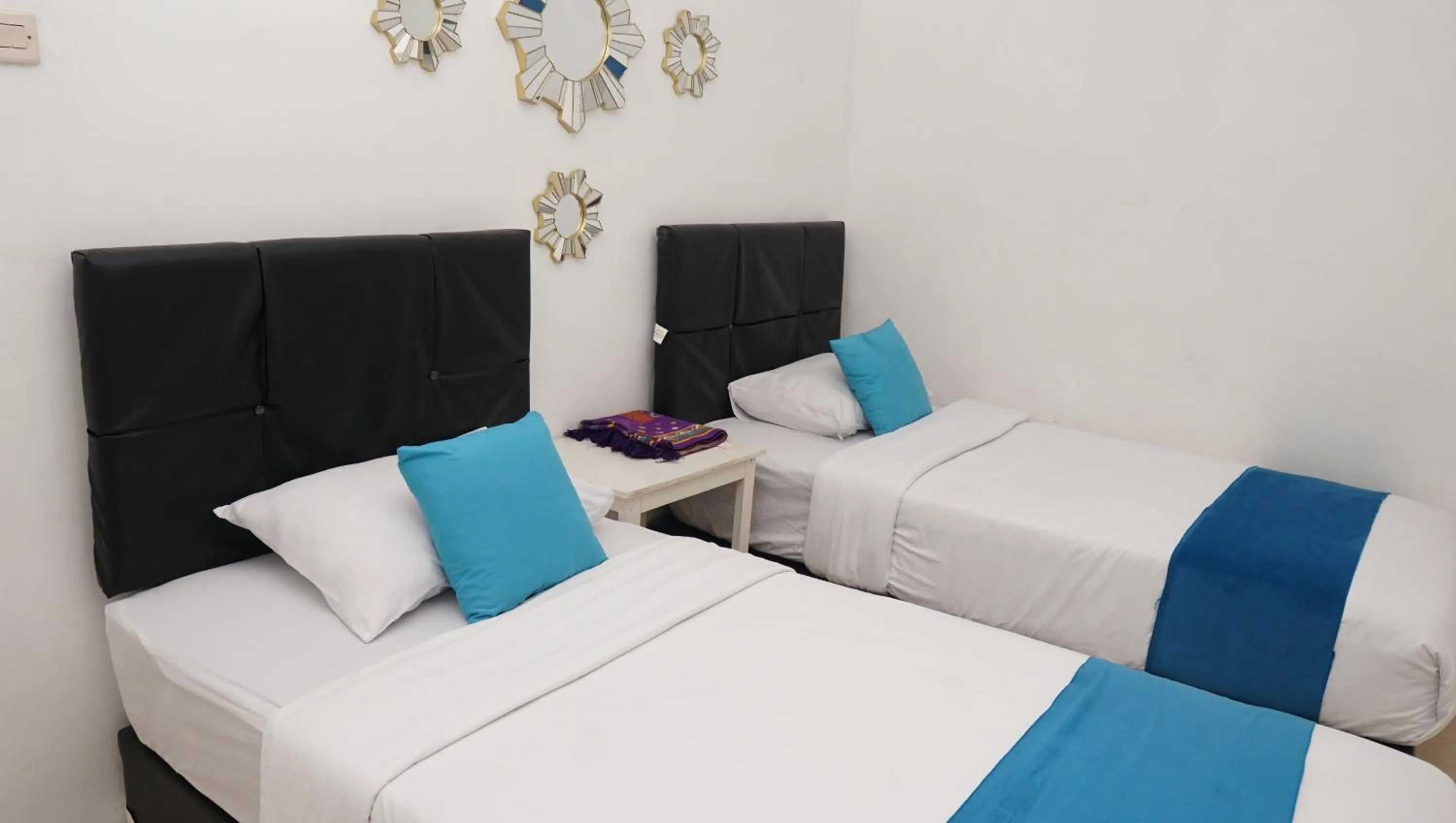 Bed in Jazz Room Kampung Inggris Syariah