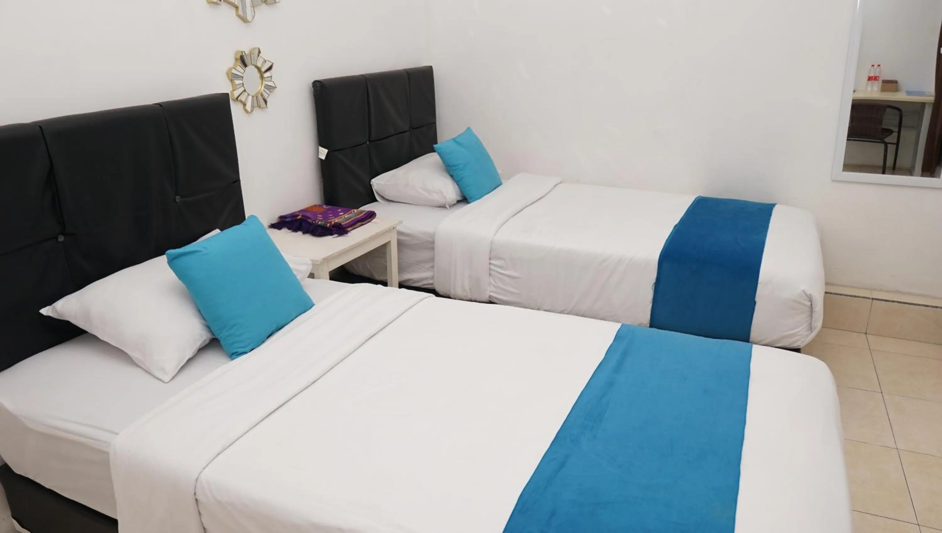 Bed in Jazz Room Kampung Inggris Syariah