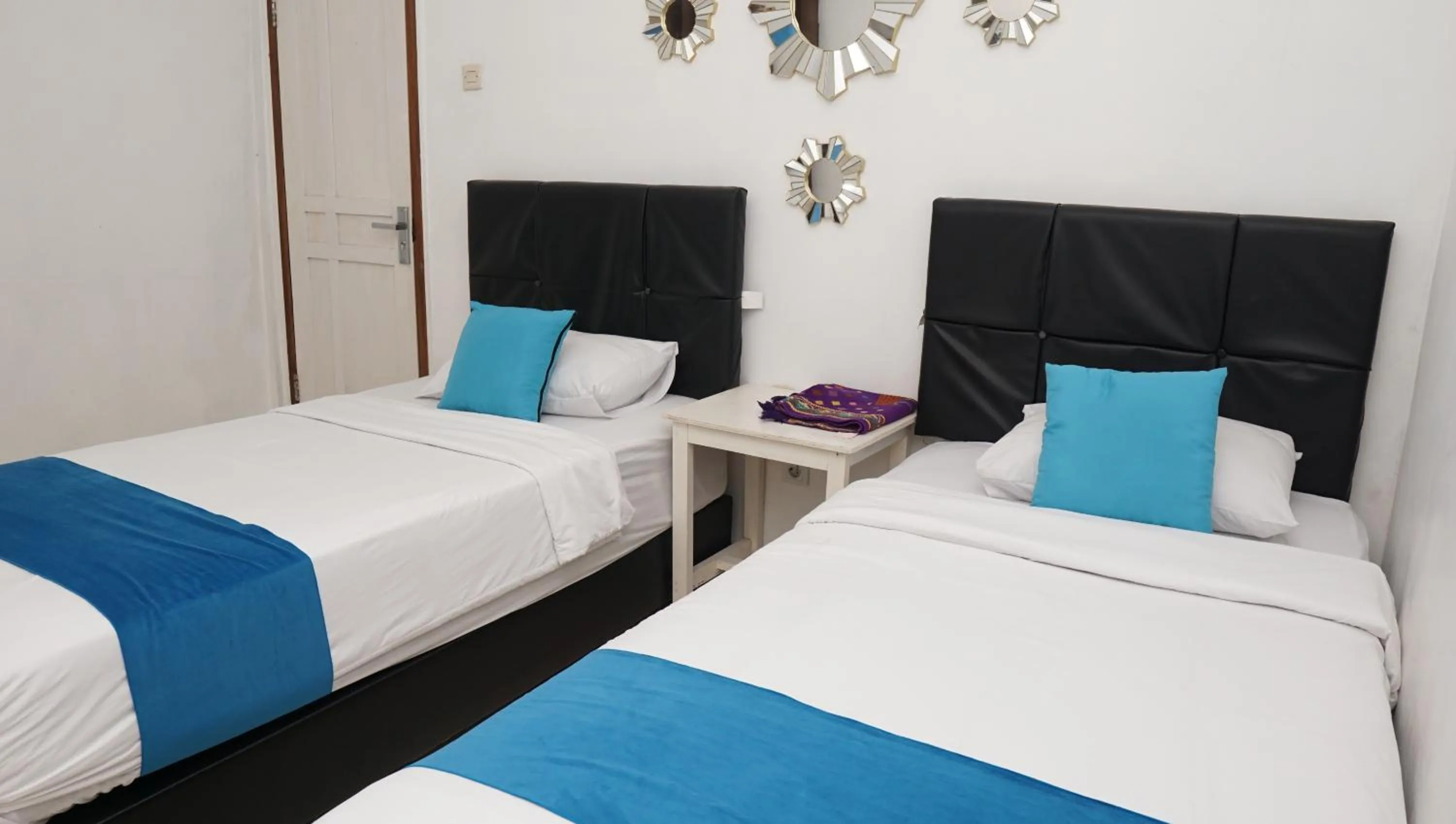 Bed in Jazz Room Kampung Inggris Syariah