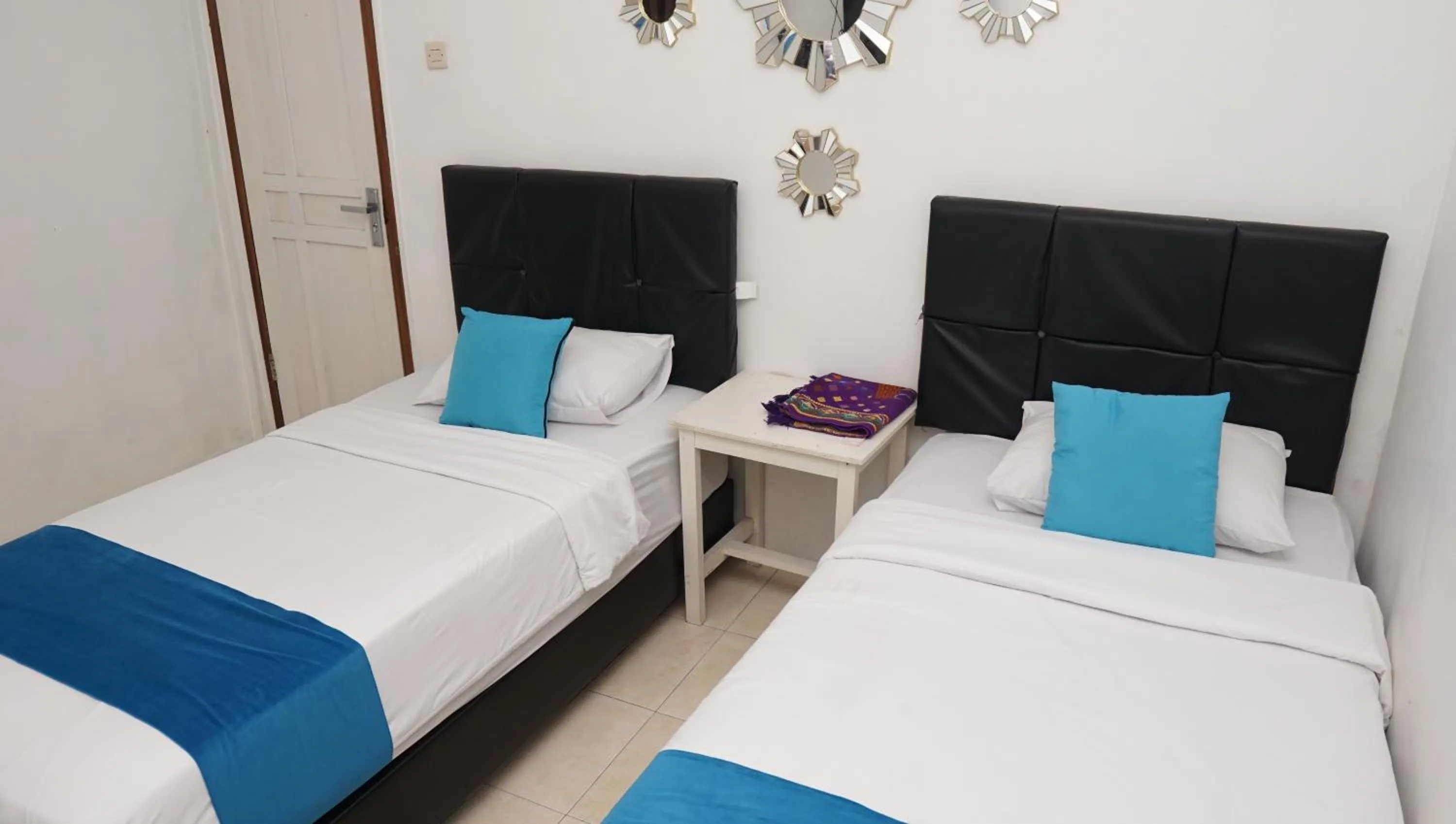 Bed in Jazz Room Kampung Inggris Syariah