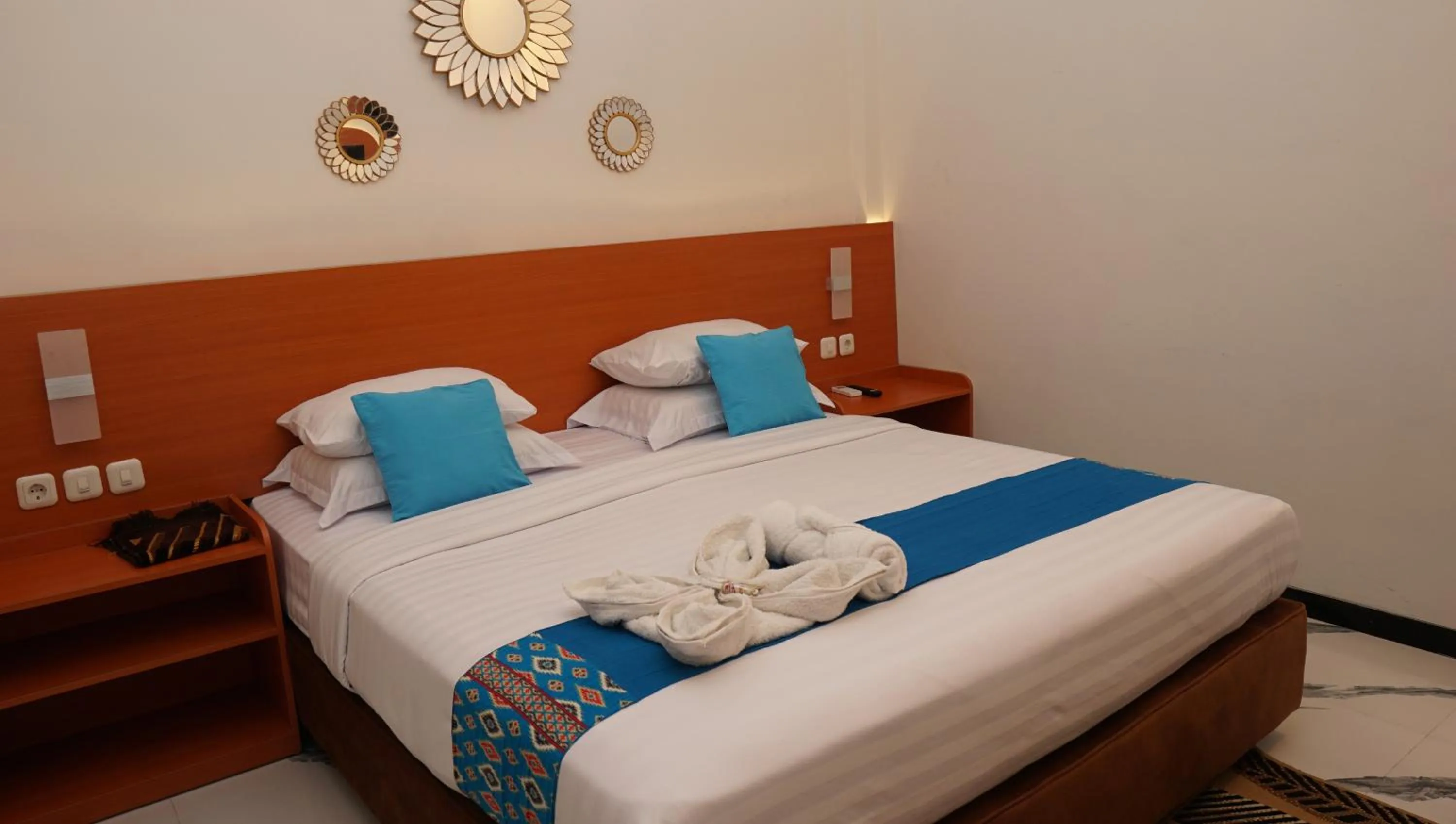 Bed in Jazz Room Kampung Inggris Syariah