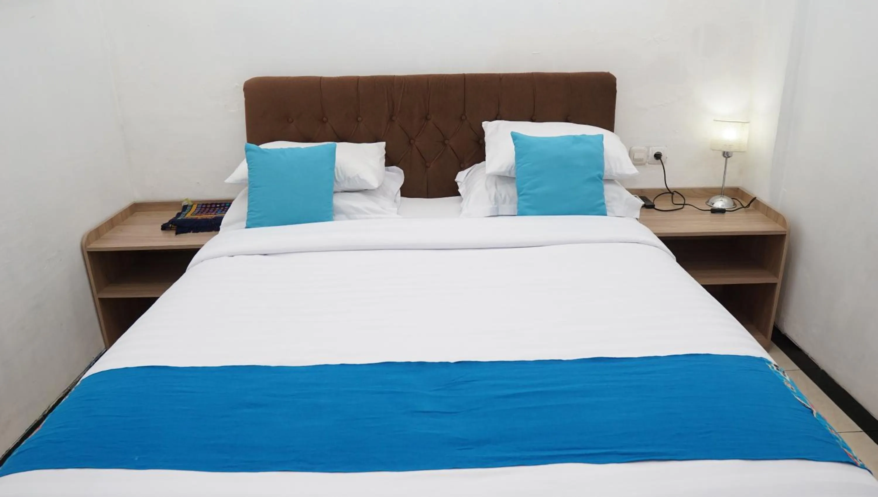 Bed in Jazz Room Kampung Inggris Syariah