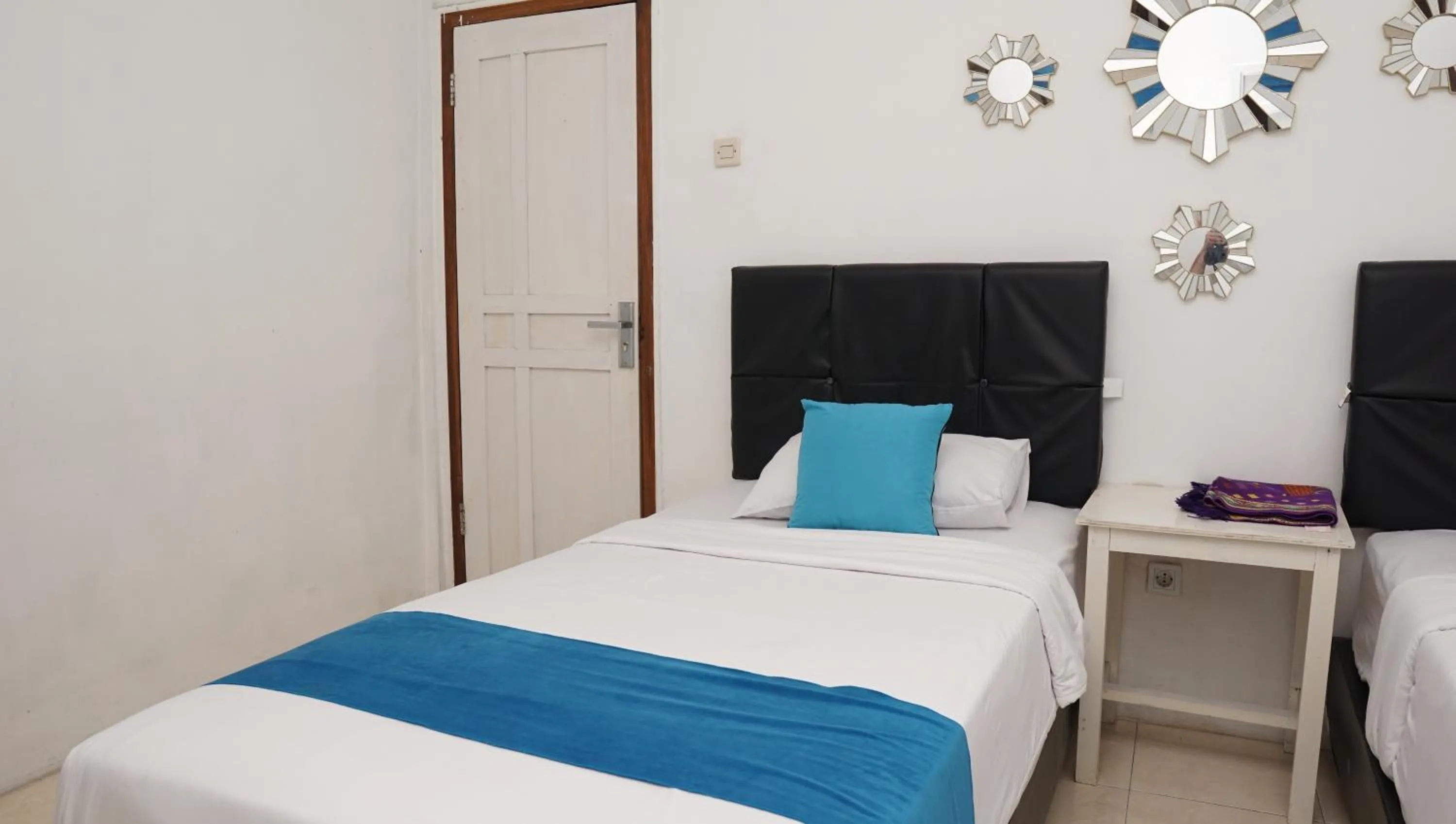 Bed in Jazz Room Kampung Inggris Syariah