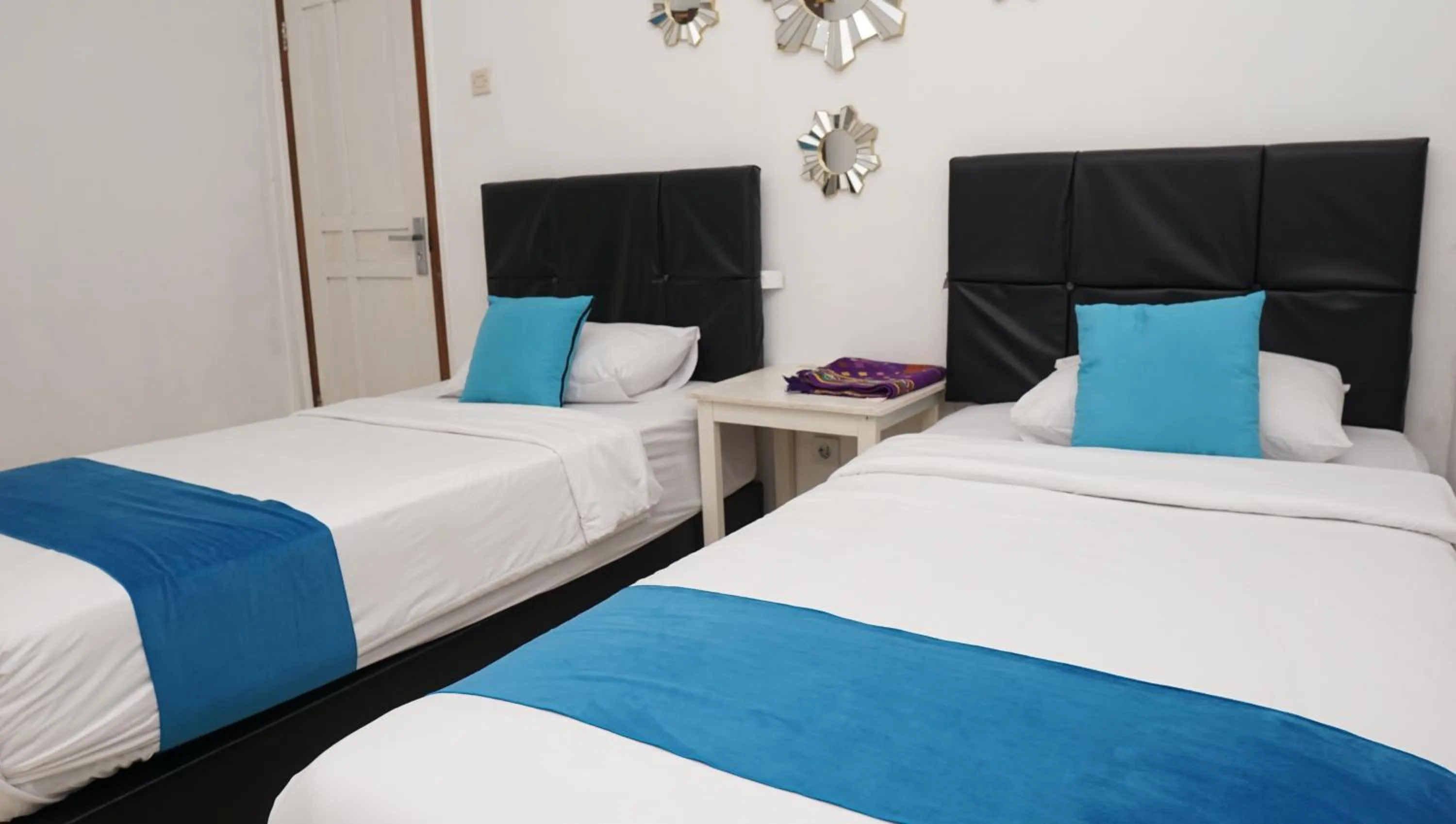 Bed in Jazz Room Kampung Inggris Syariah