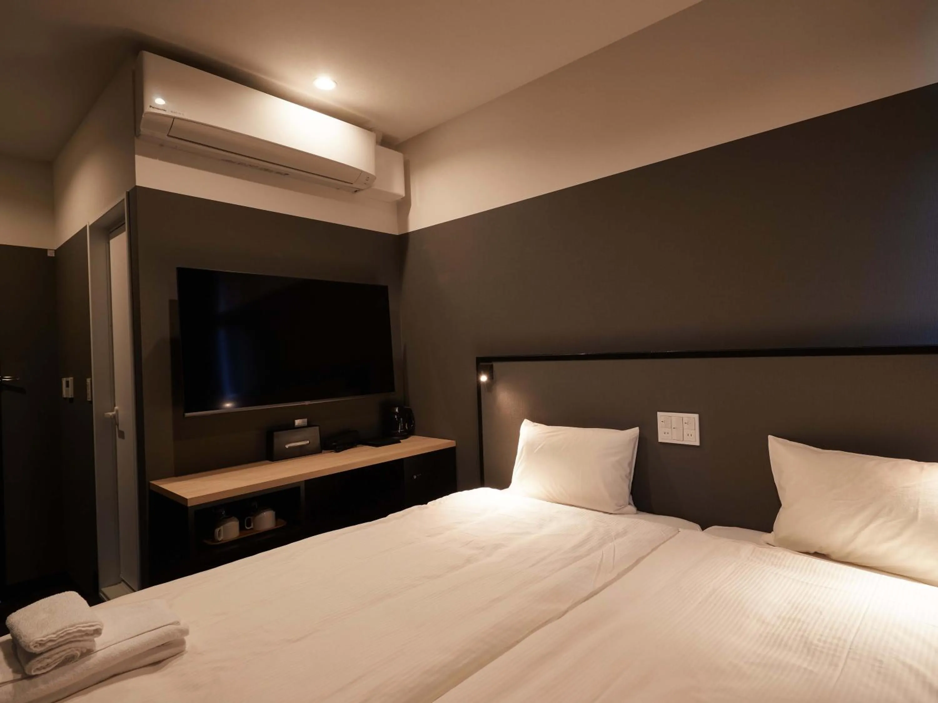 Bed in CABIN&HOTEL CONSTANT NAHA