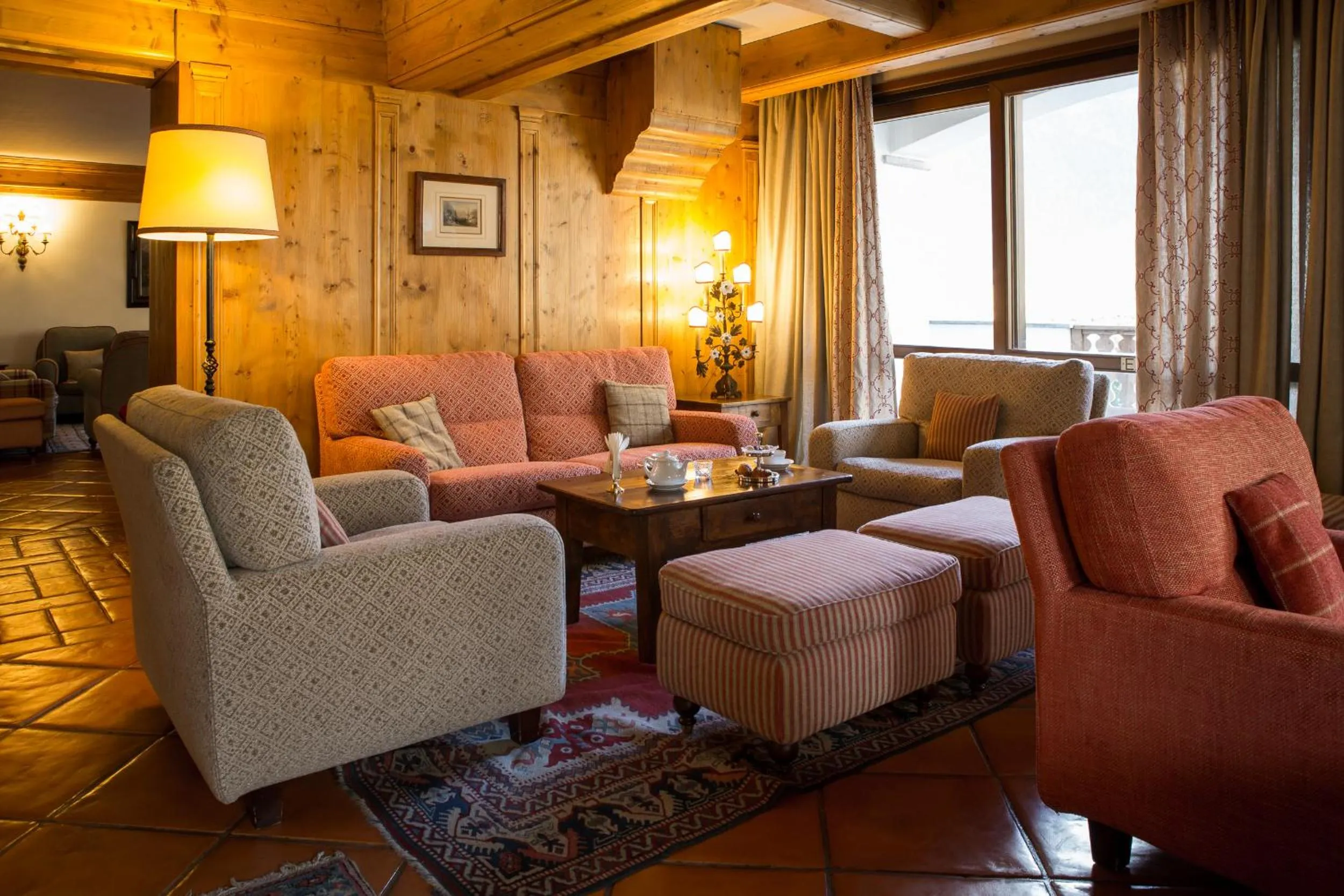 Communal lounge/ TV room in Gran Baita Hotel & Wellness