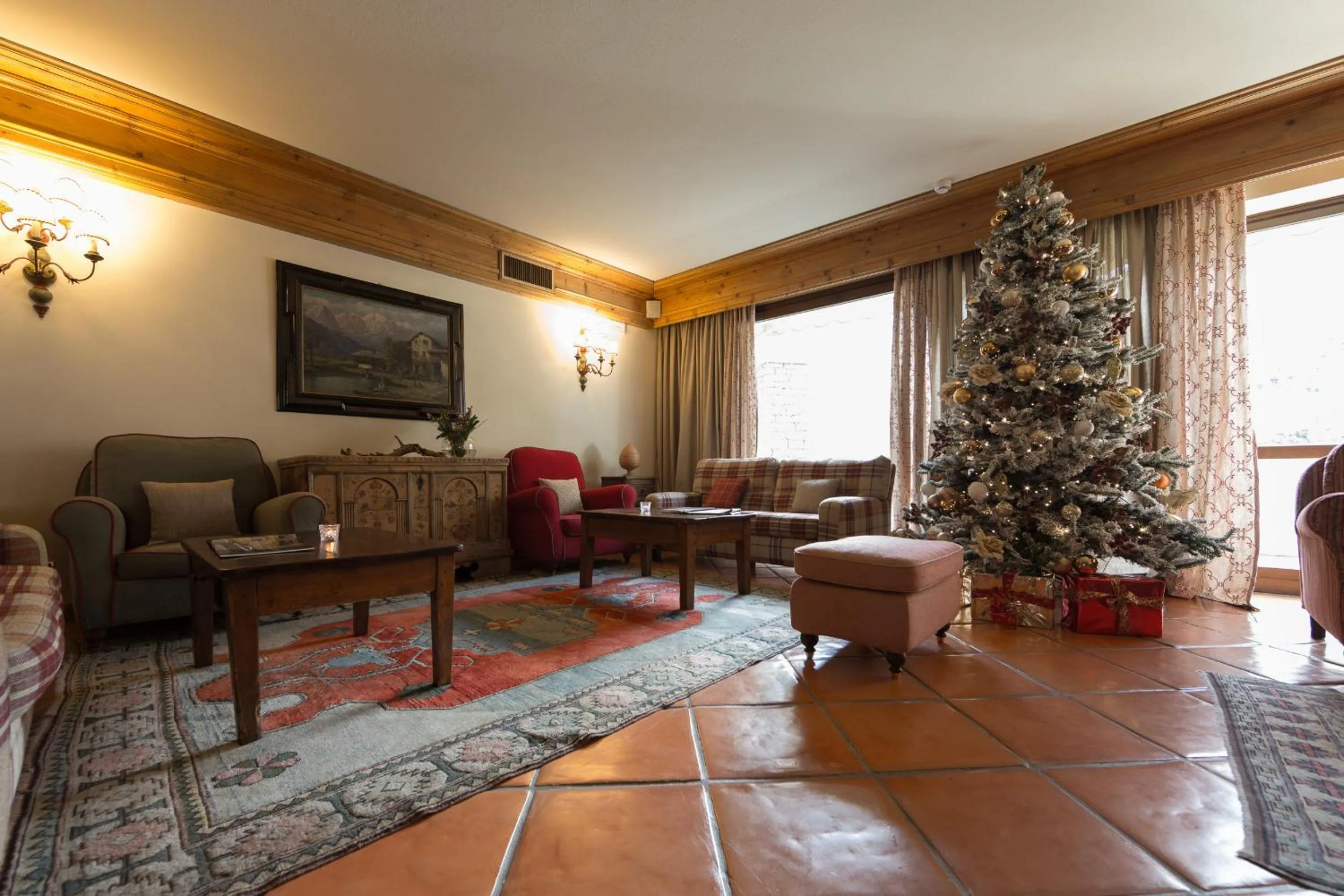 Communal lounge/ TV room in Gran Baita Hotel & Wellness