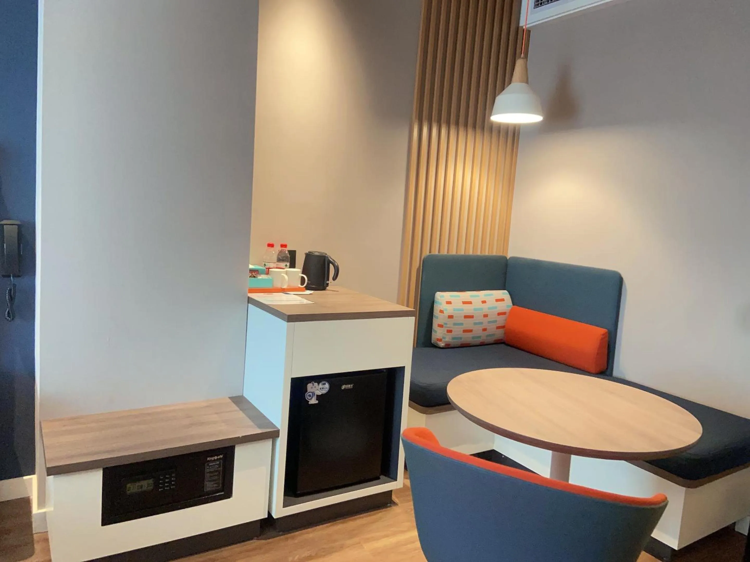 Seating area in Holiday Inn Express Shanghai Expo Centre by IHG