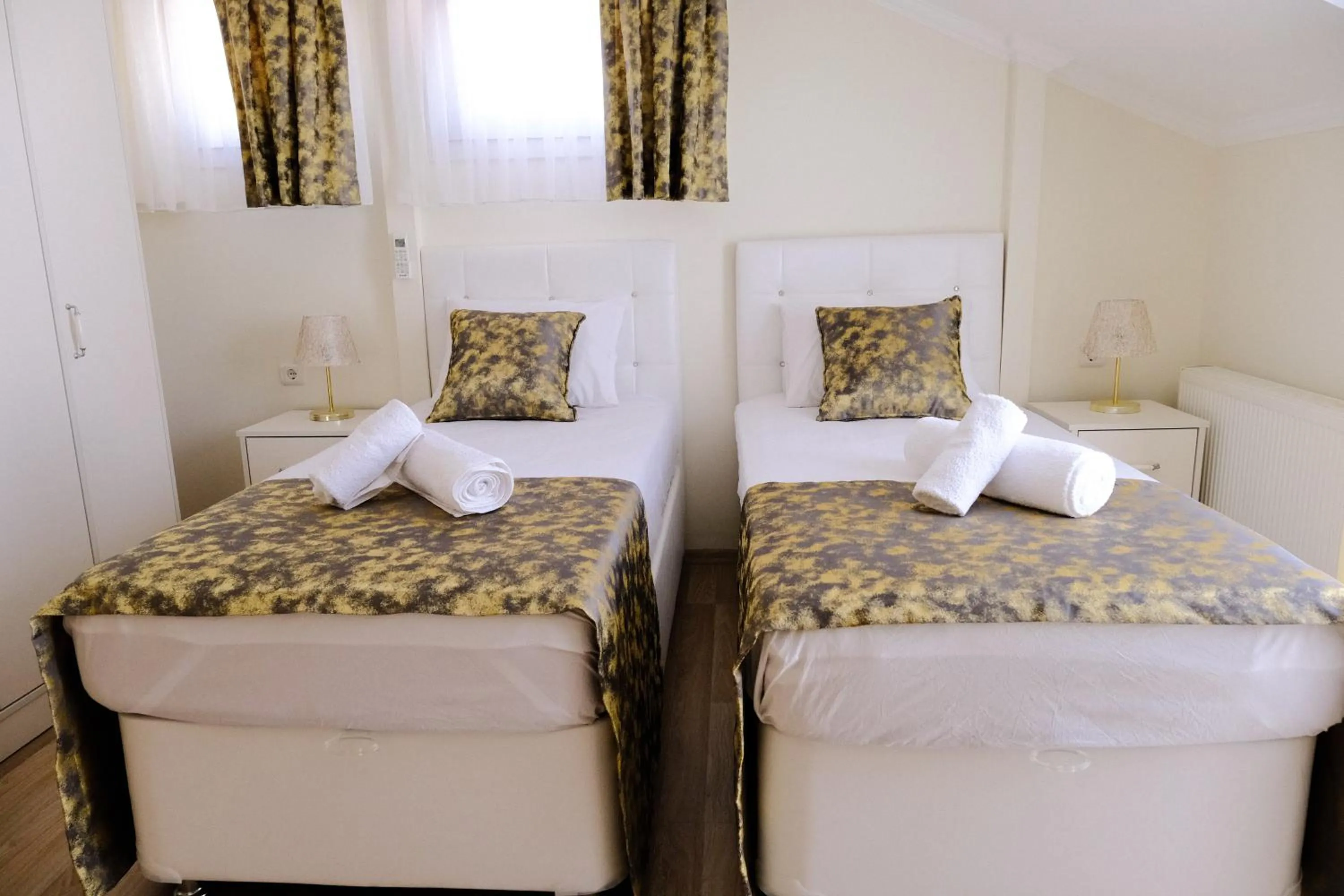 Bed in Ozgur City Residence