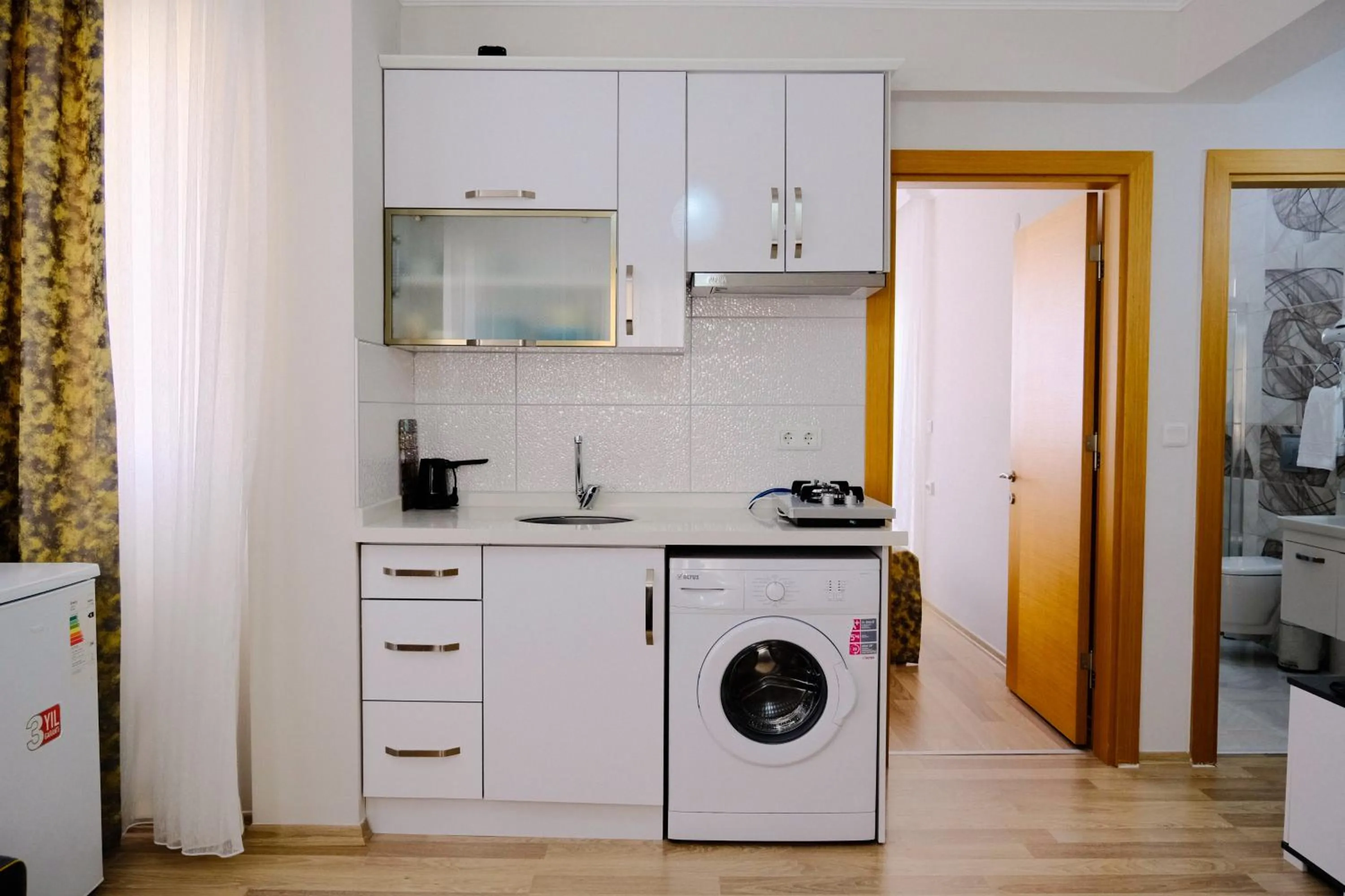 Kitchen or kitchenette in Ozgur City Residence