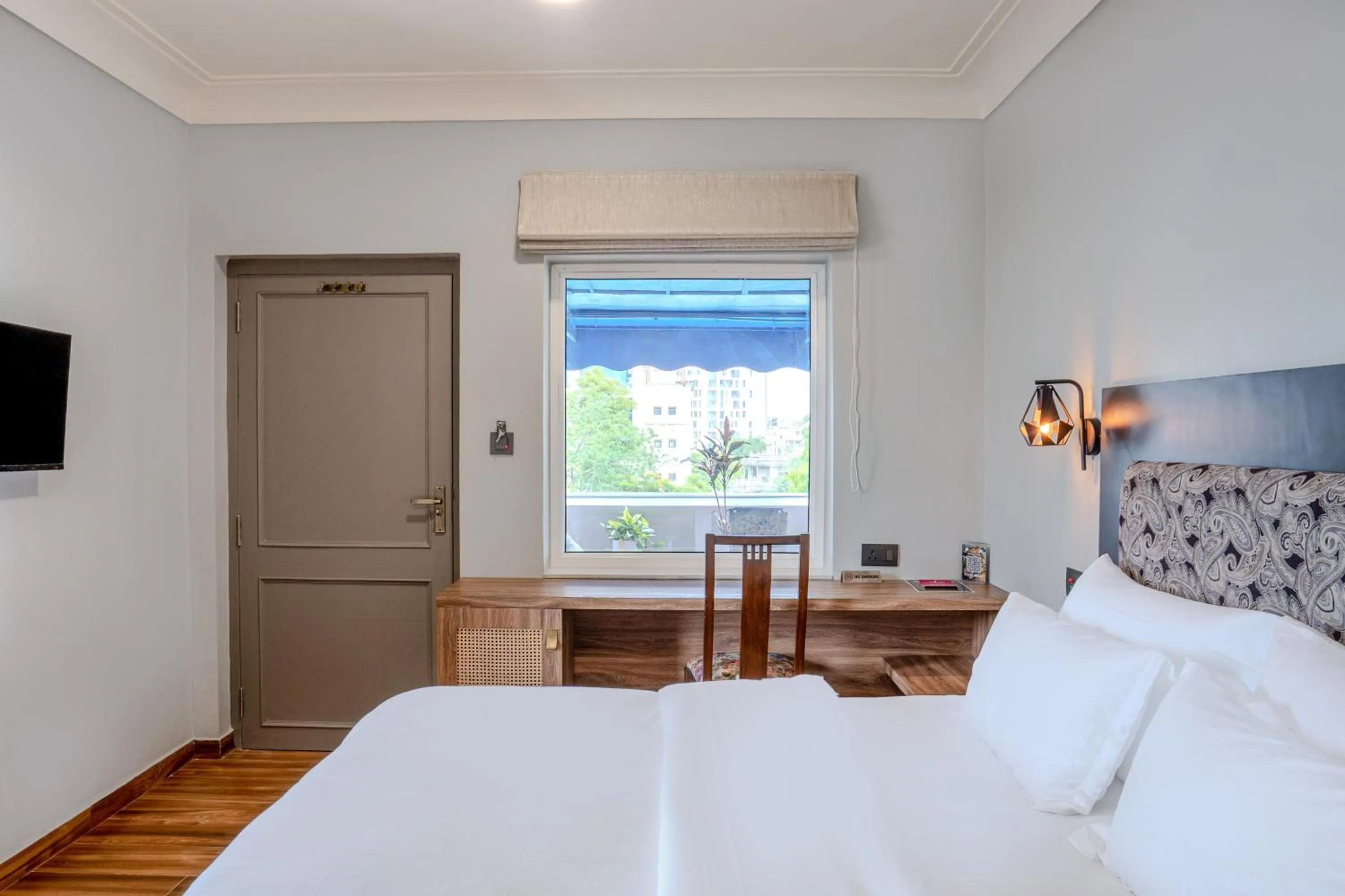 Bed in Girisadan - A City Centre Boutique Hotel