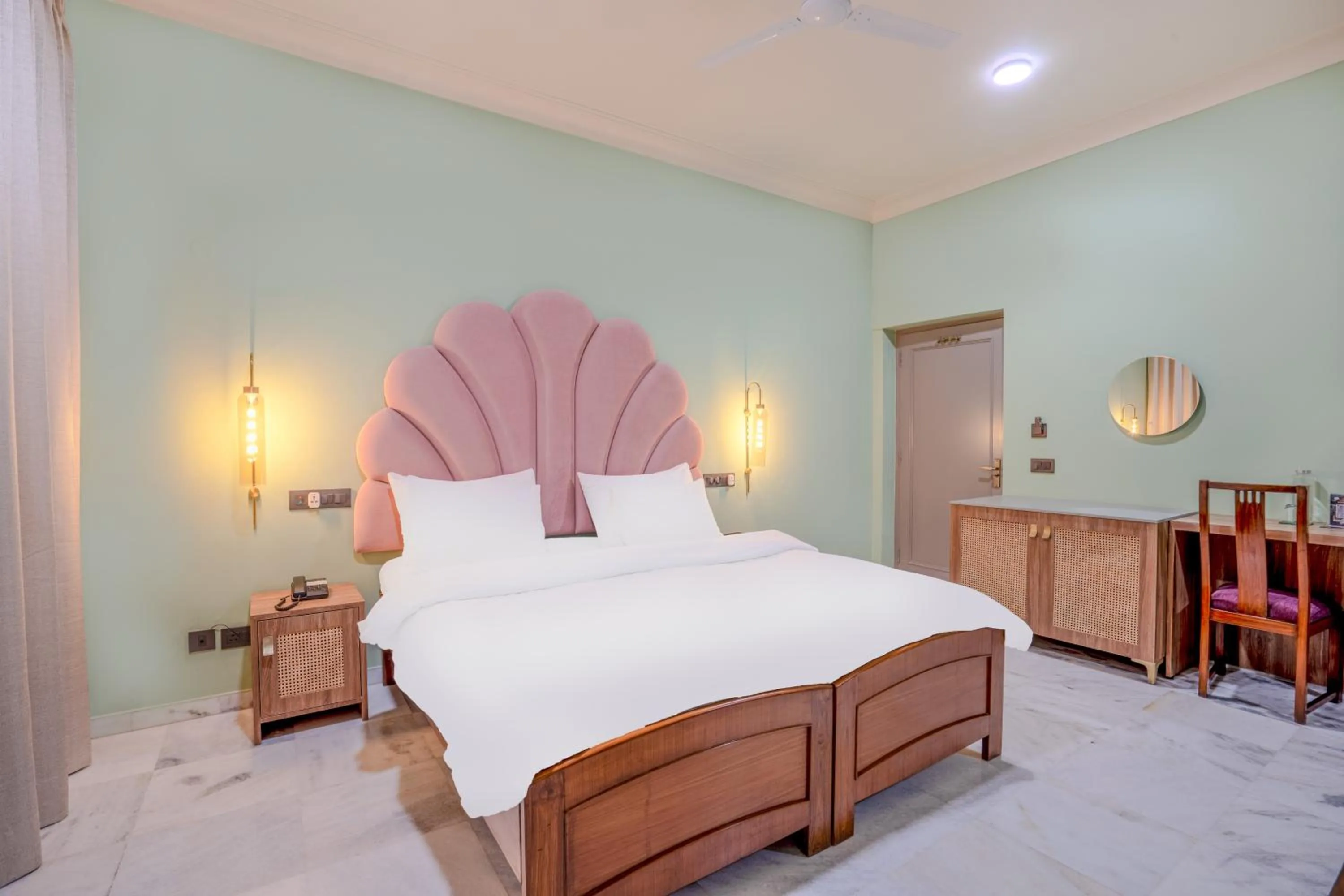 Bed in Girisadan - A City Centre Boutique Hotel
