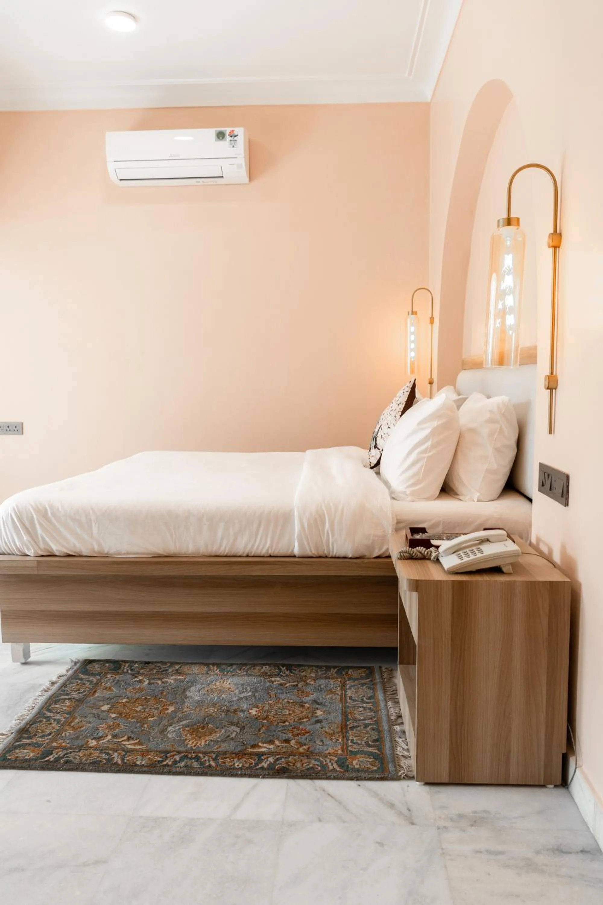 Bed in Girisadan - A City Centre Boutique Hotel