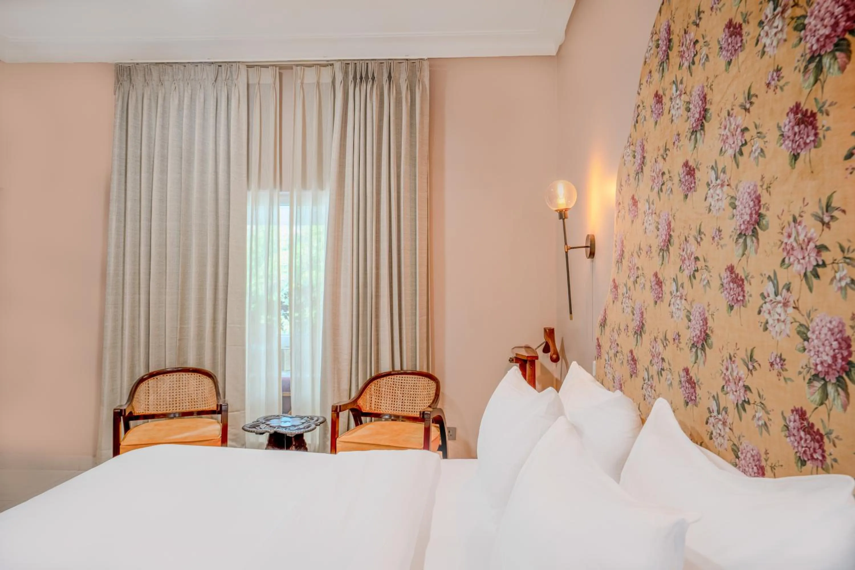 Bed in Girisadan - A City Centre Boutique Hotel