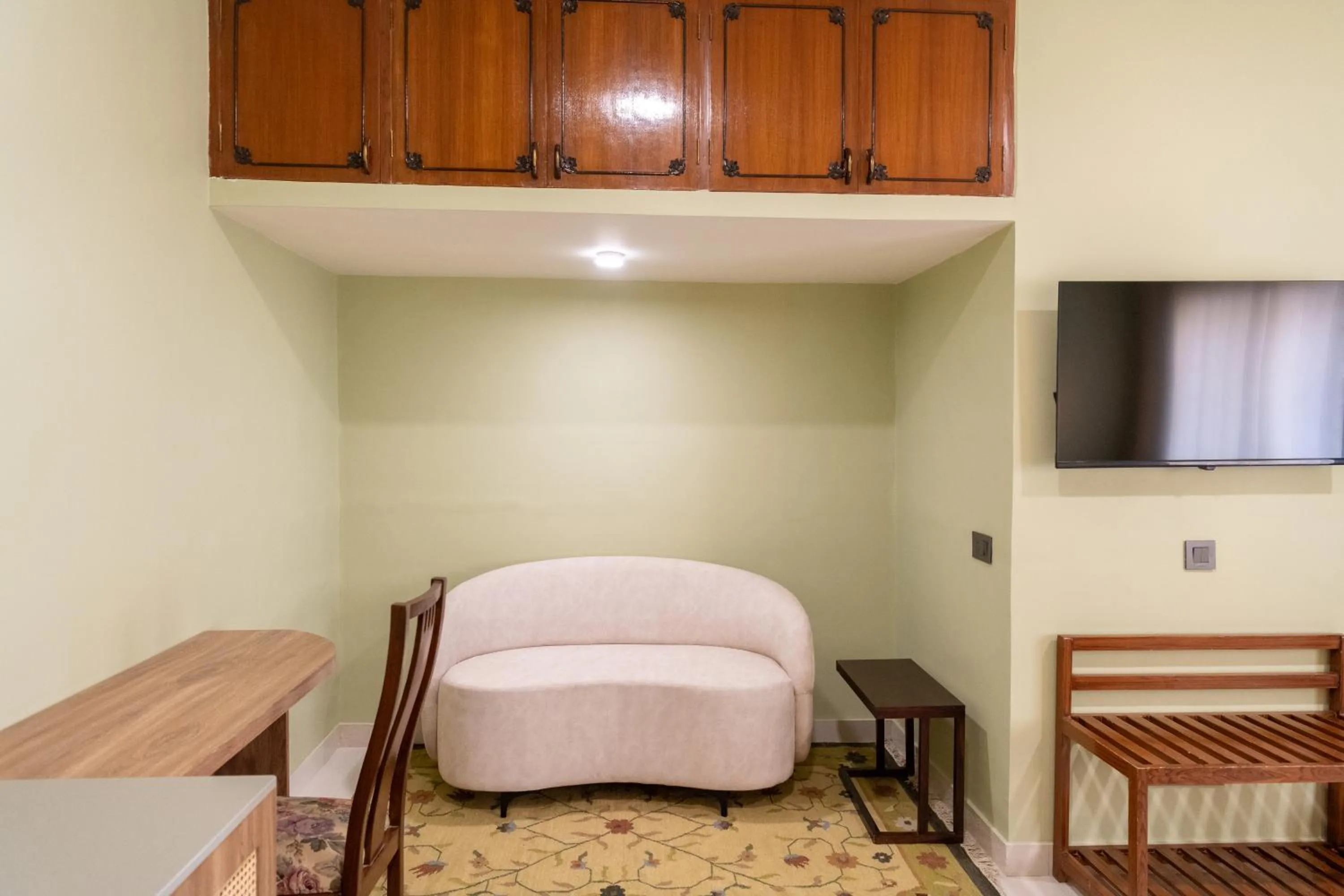 Seating area, Bed in Girisadan - A City Centre Boutique Hotel