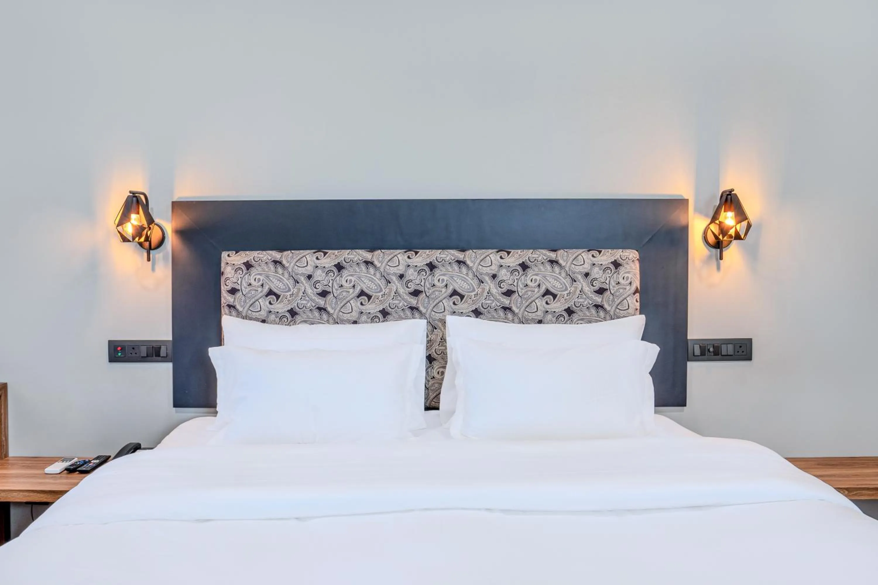 Bed in Girisadan - A City Centre Boutique Hotel