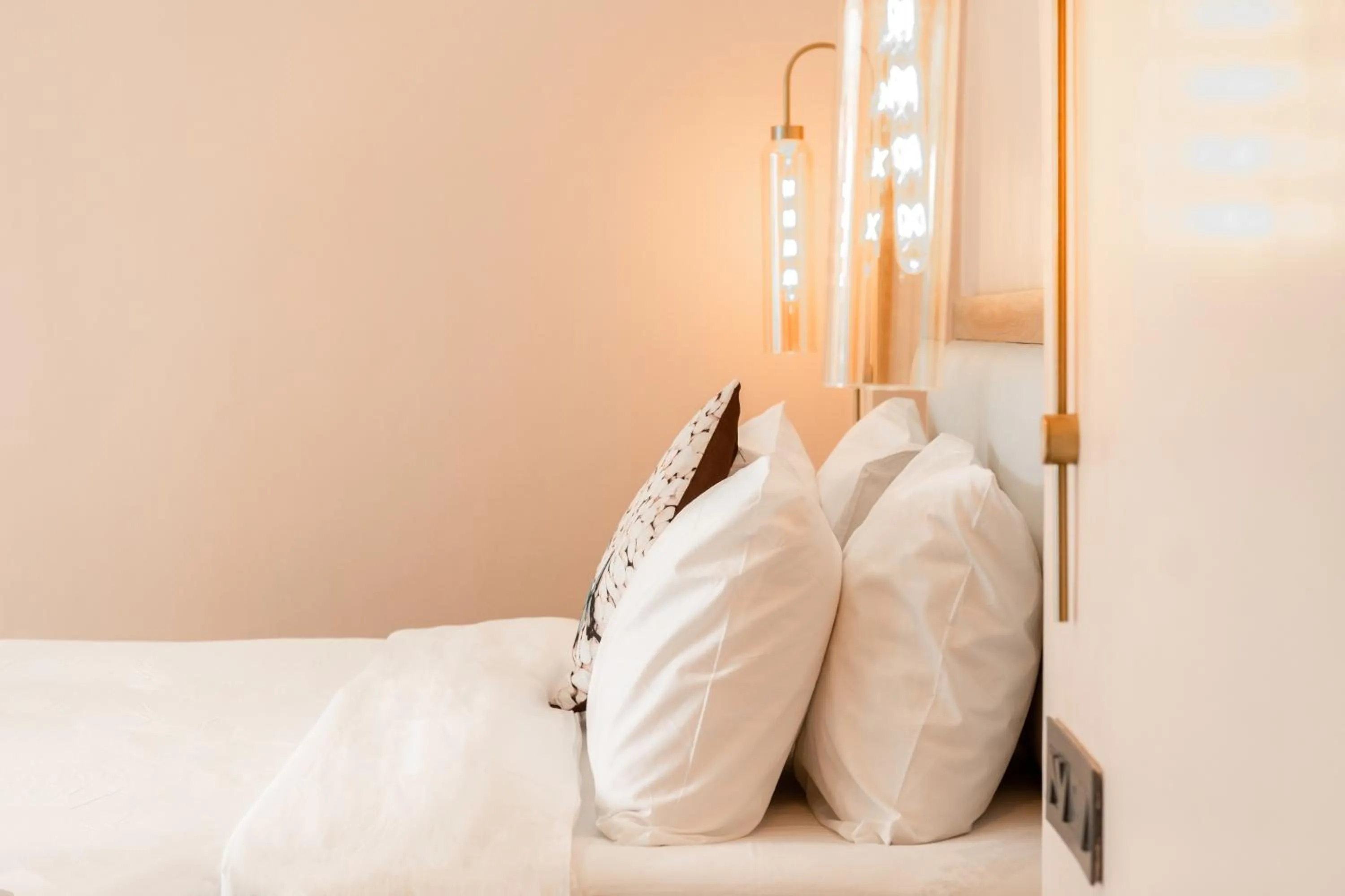 Bed in Girisadan - A City Centre Boutique Hotel