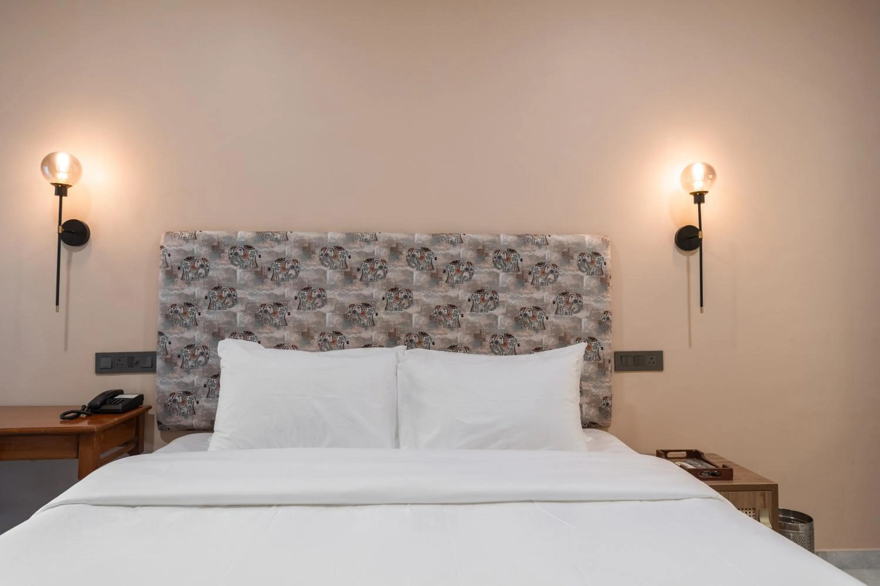 Bed in Girisadan - A City Centre Boutique Hotel