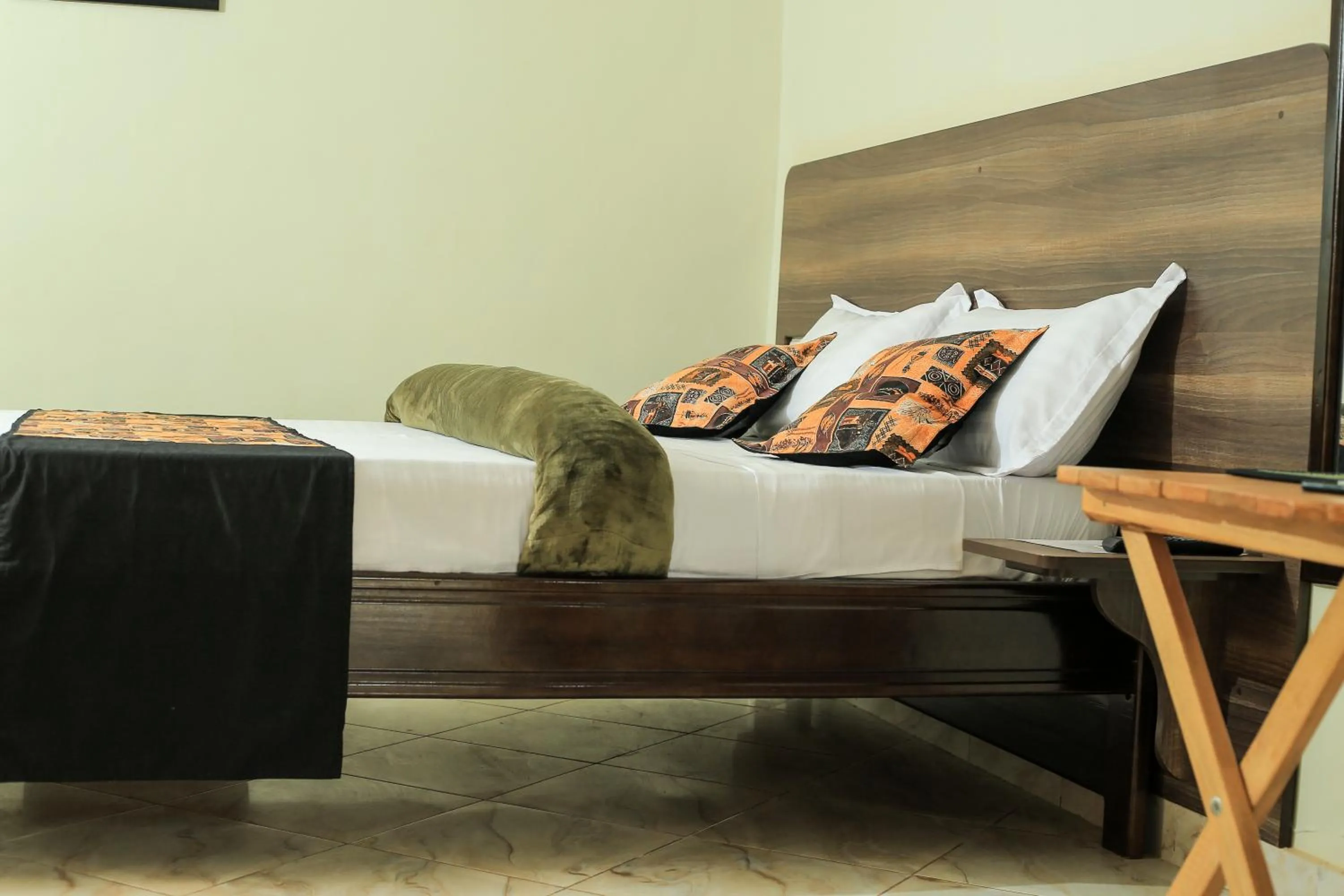 Bed in Triple Tee Gardens & Accomodation