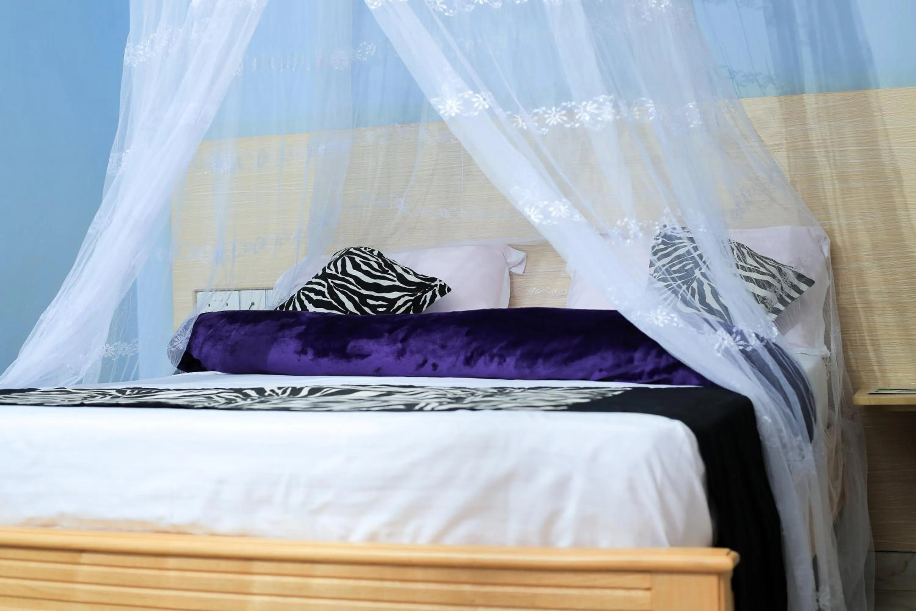 Bed in Triple Tee Gardens & Accomodation