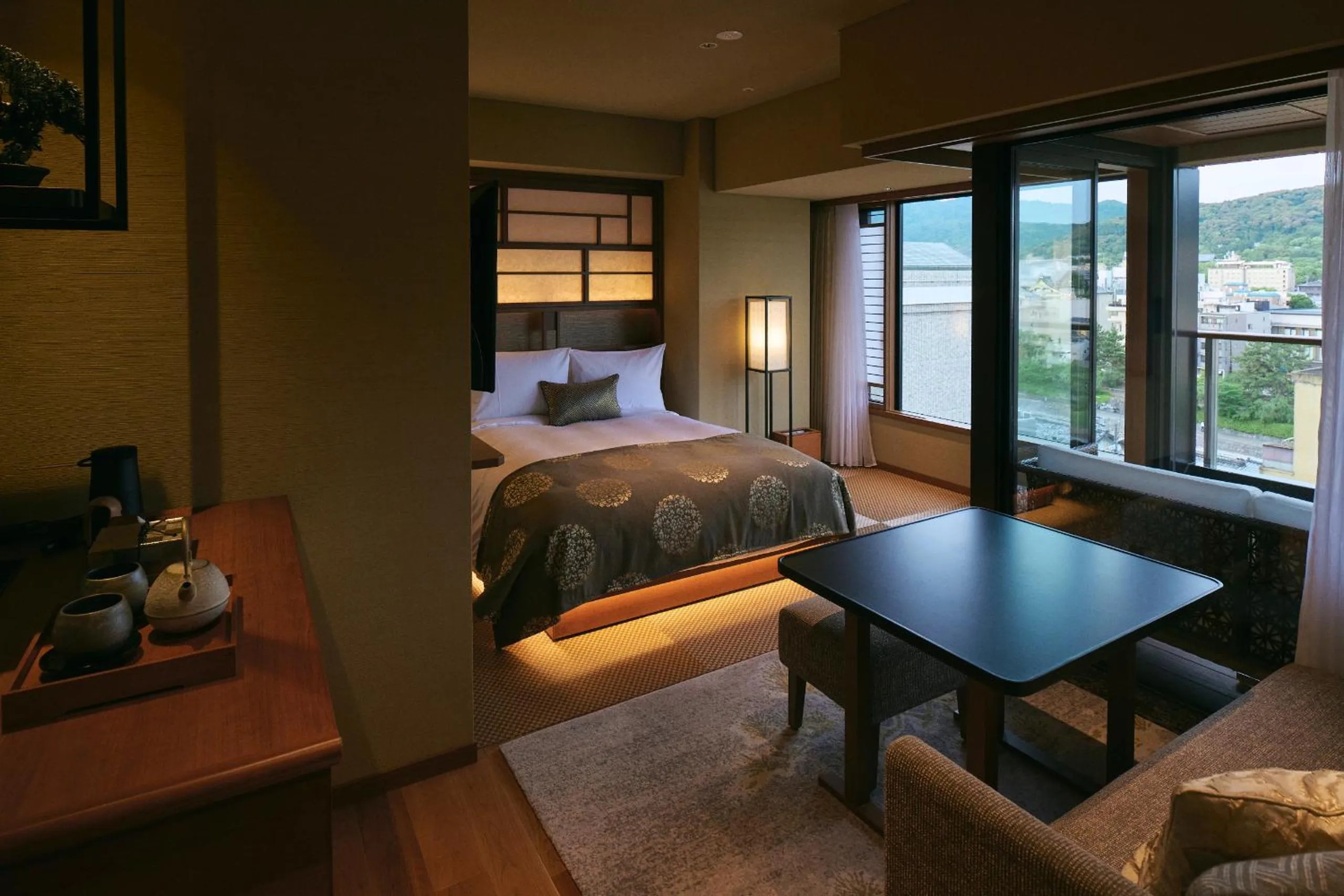 Dining area, Bed in Sora Niwa Terrace Kyoto Bettei