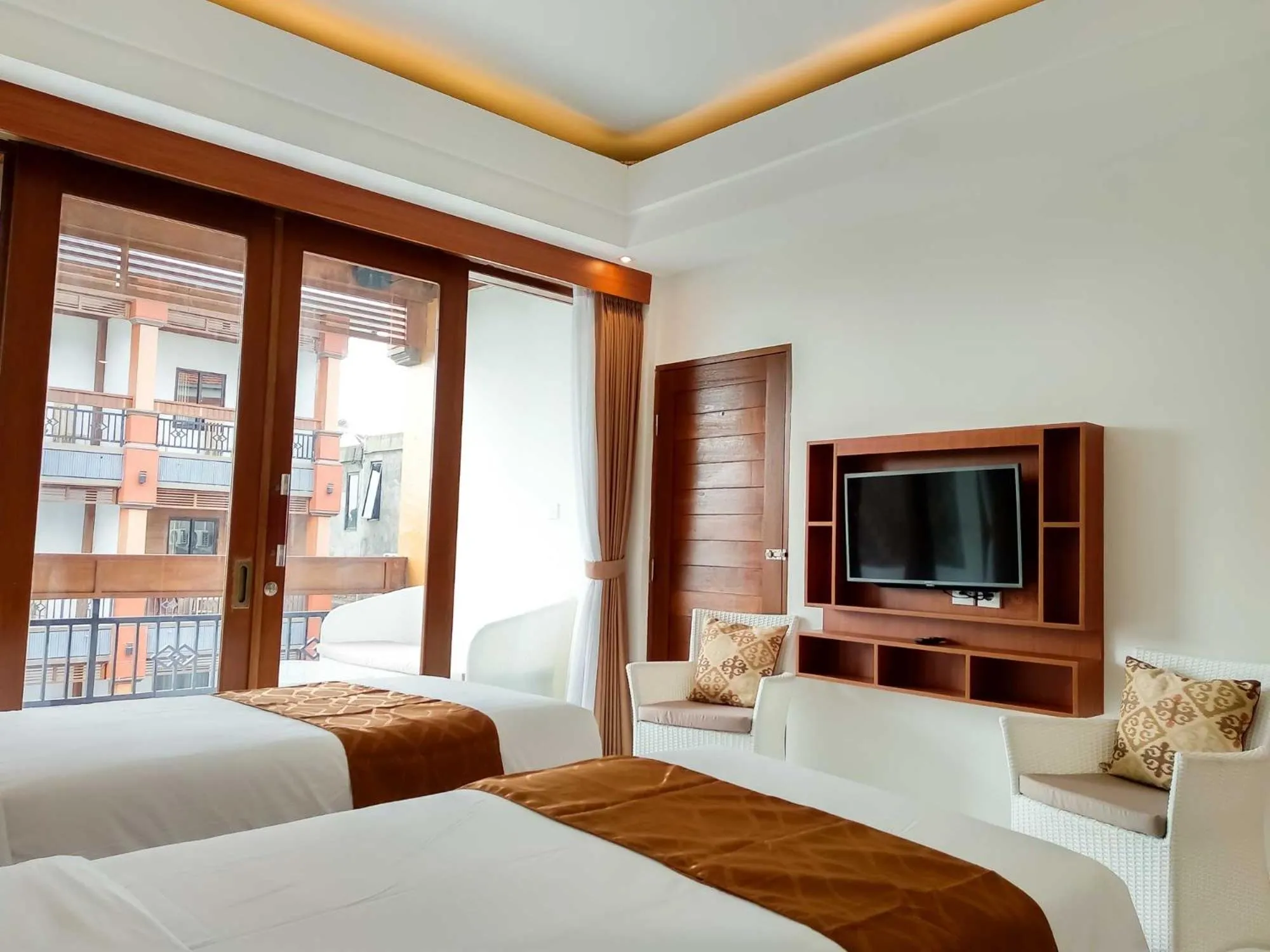 TV and multimedia, Bed in The Tunjung Boutique Resort