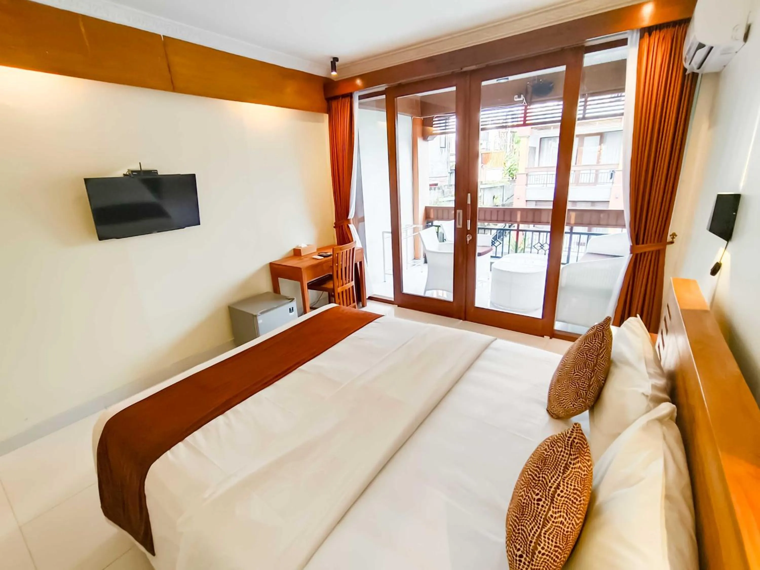 TV and multimedia, Bed in The Tunjung Boutique Resort