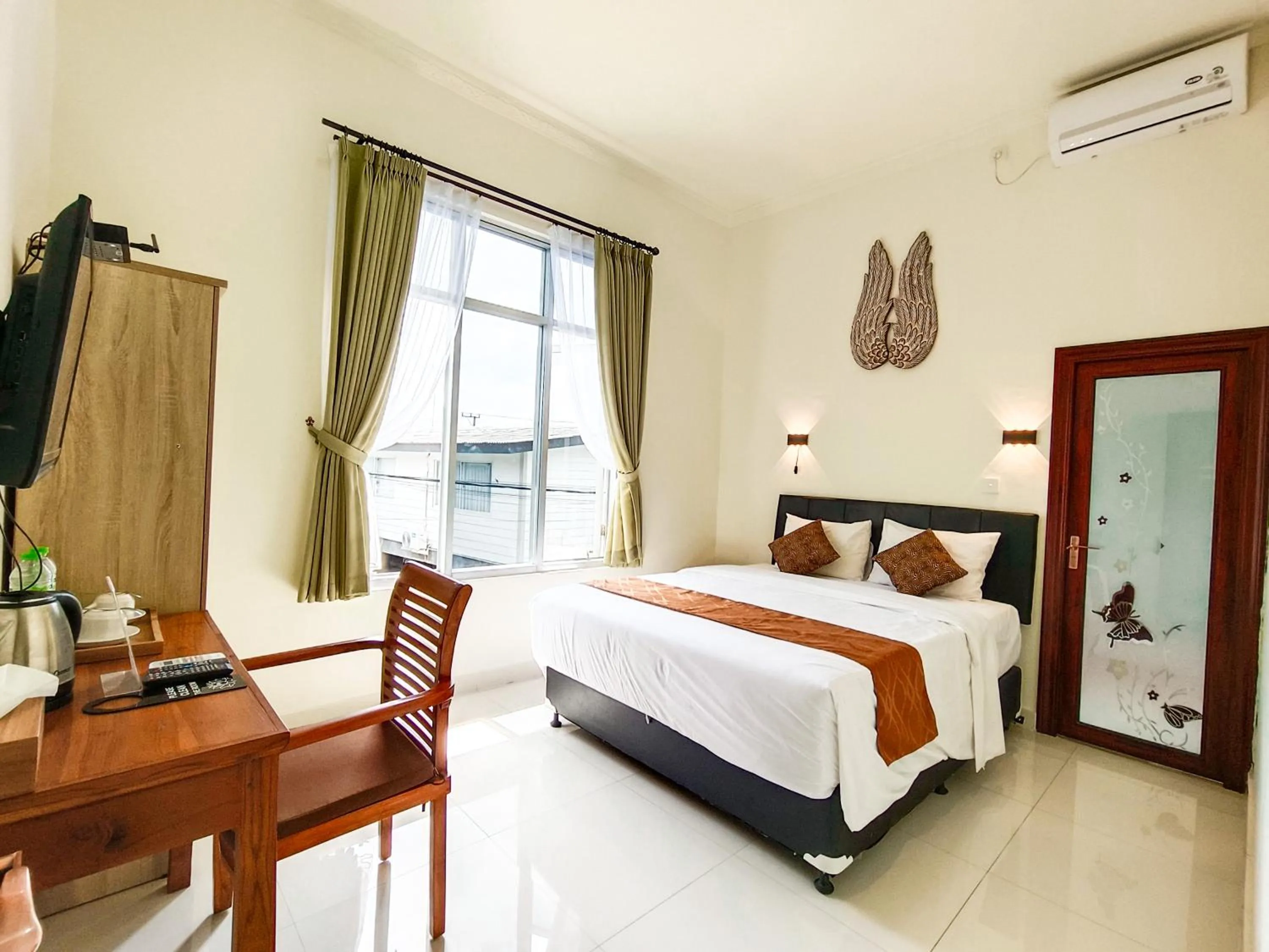 Photo of the whole room, Bed in The Tunjung Boutique Resort