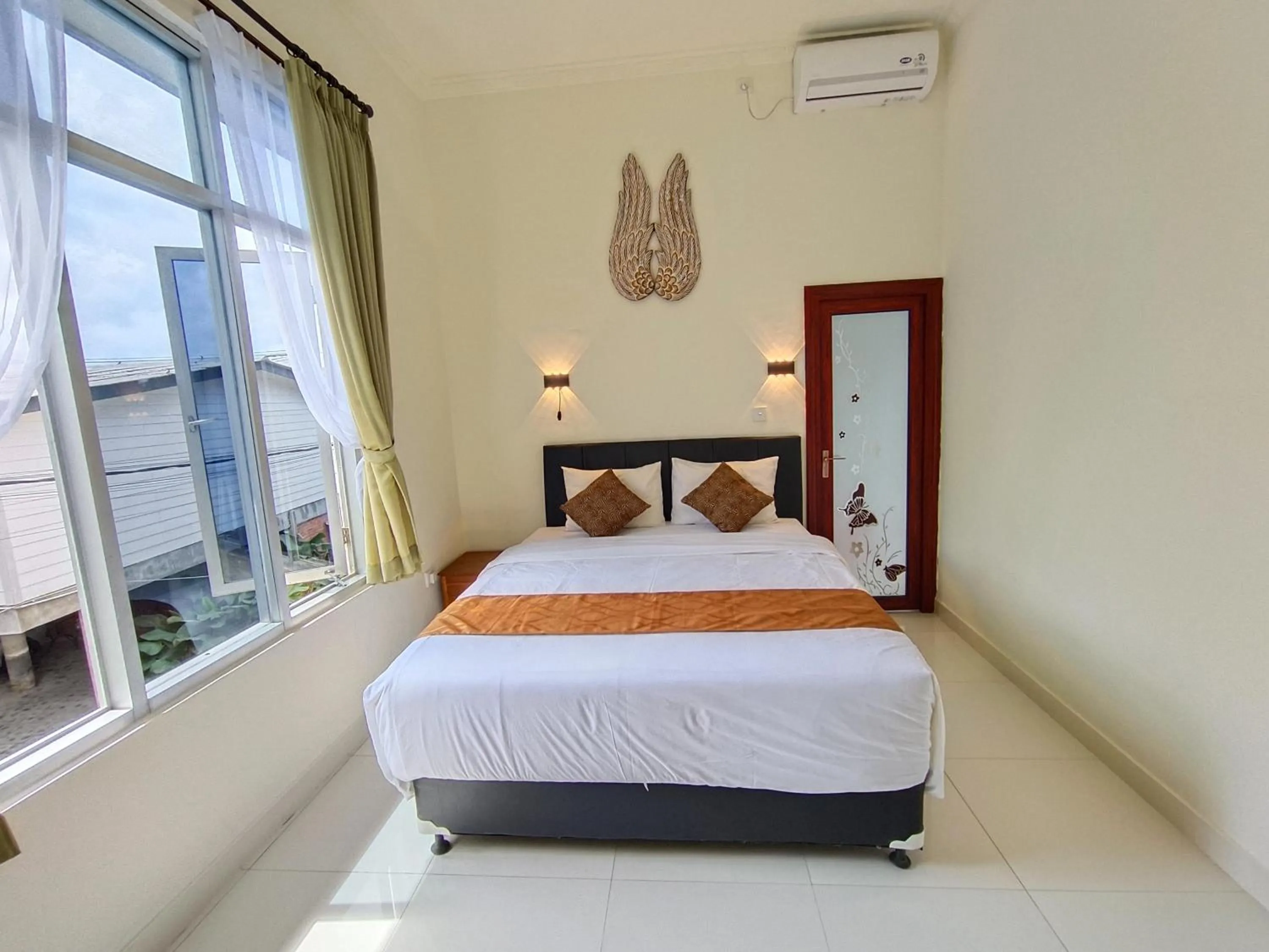 Bed in The Tunjung Boutique Resort